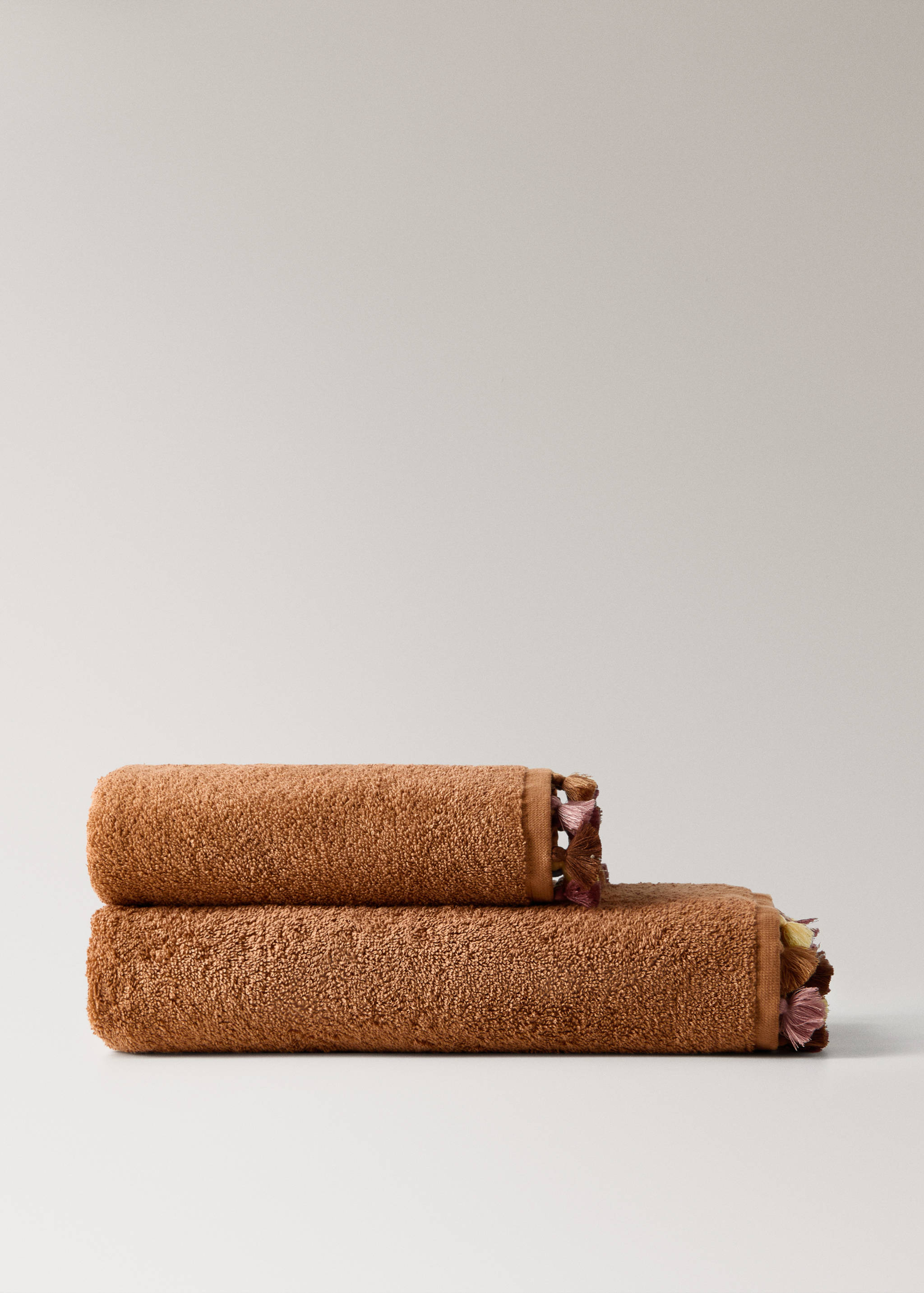 Cotton children's multi-coloured hand towel with pompoms - Article without model