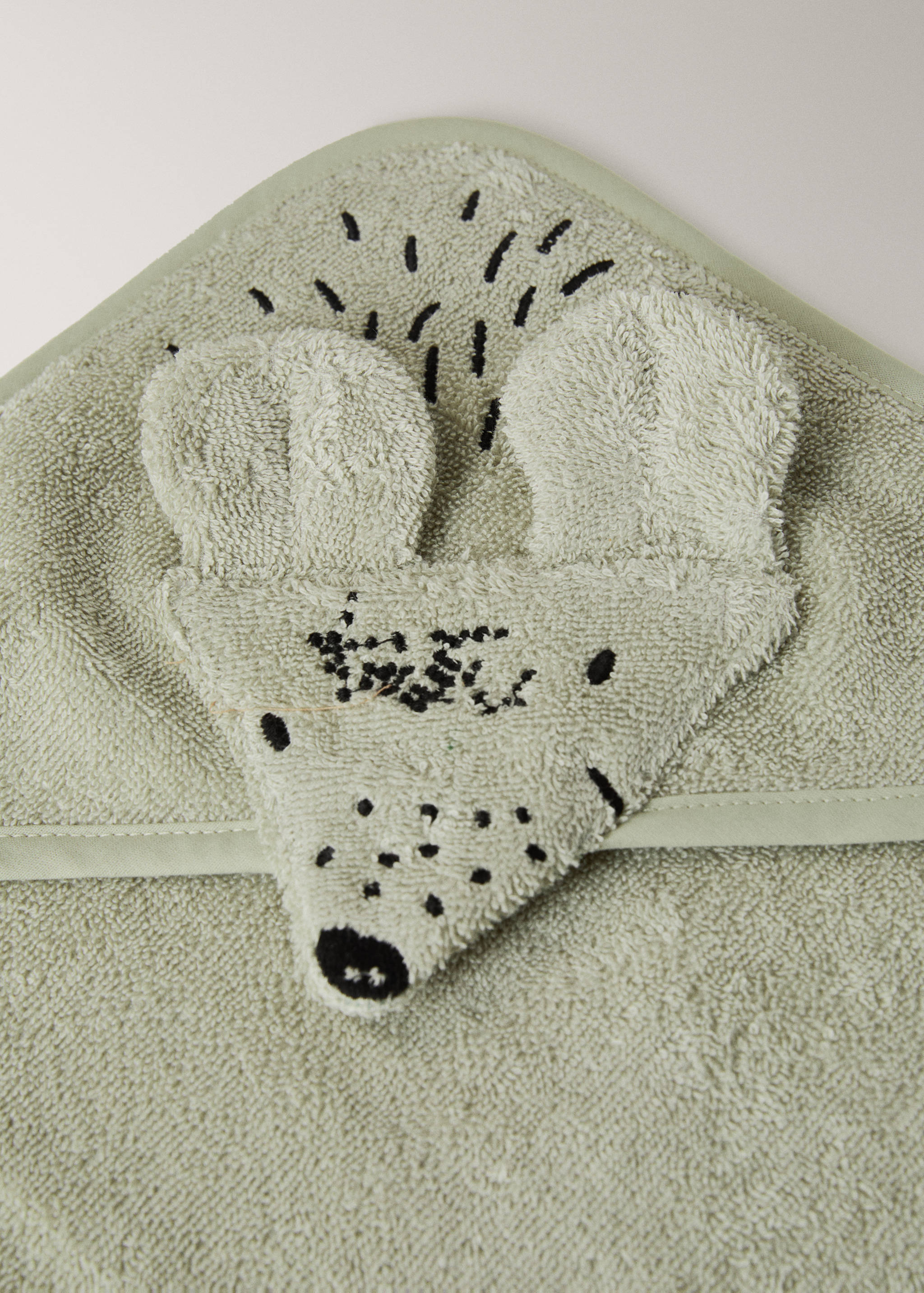 Pale green terry cotton hooded towel with embroidered mouse face detail