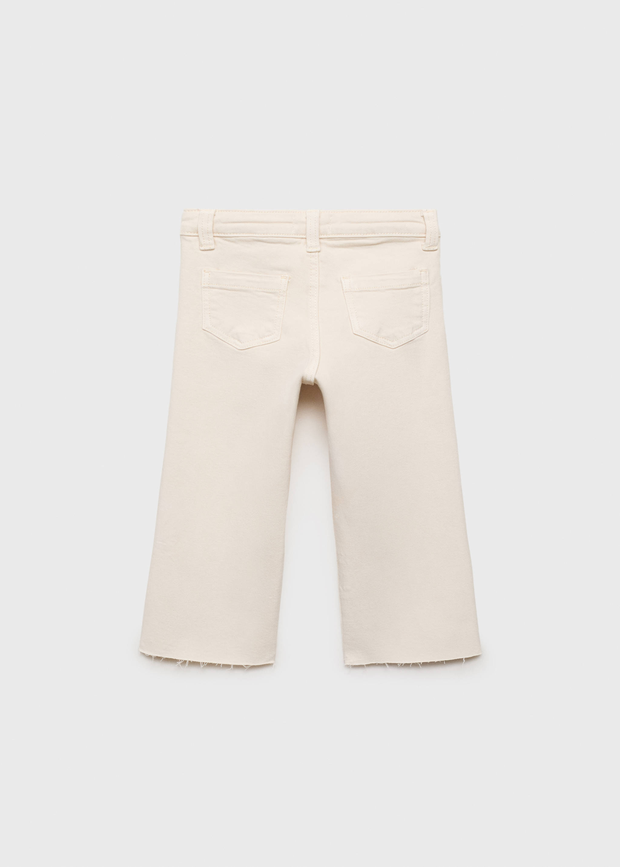 Seamless jeans with frayed hem - Reverse of the article