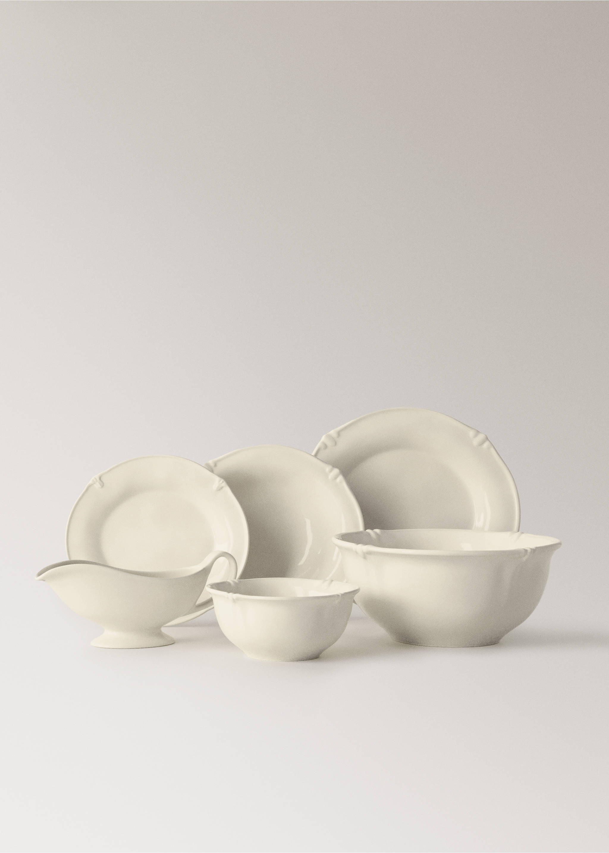 Oval stoneware dessert plate - Details of the article 3, Ecru. Ref: 17022038-00.