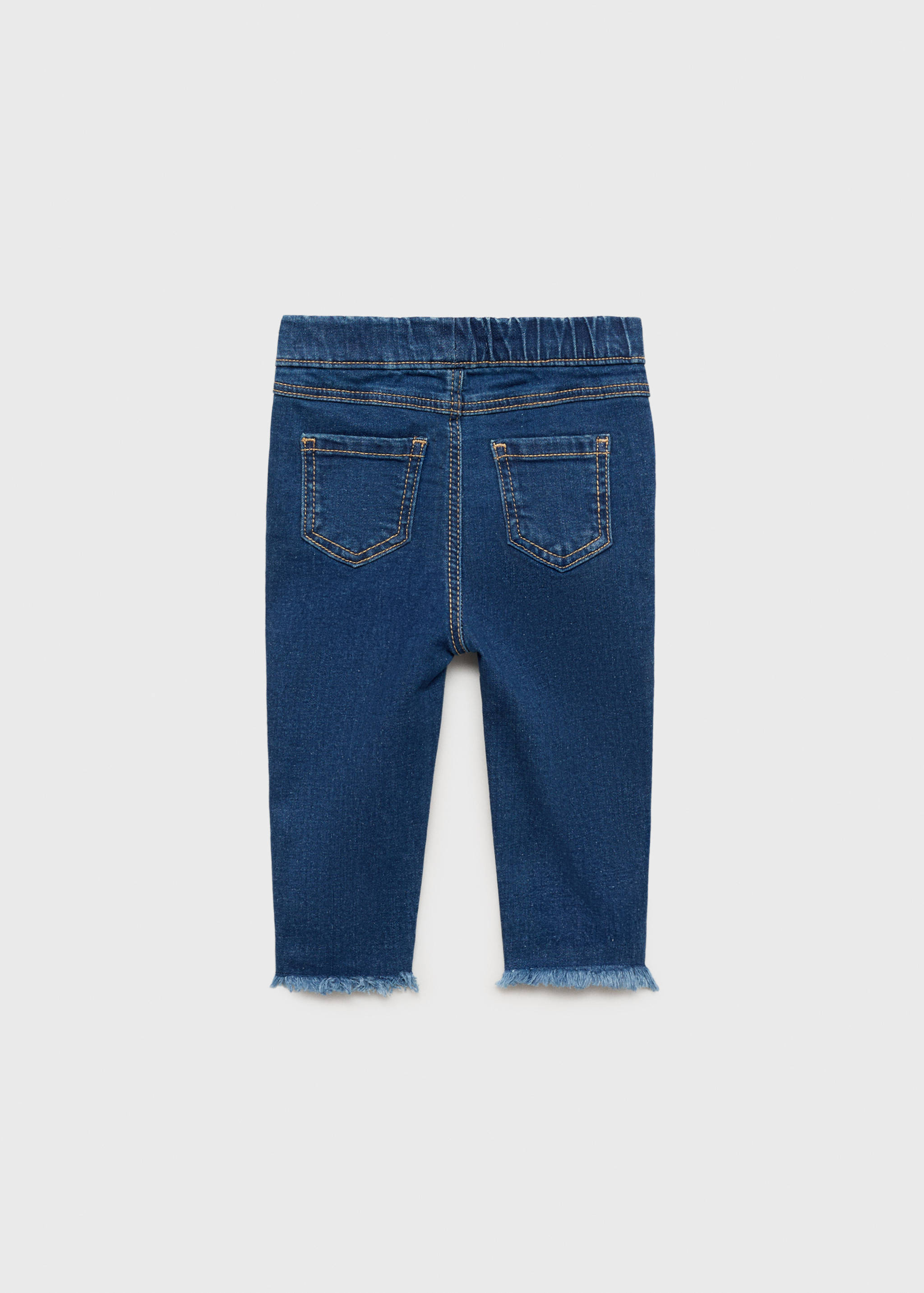 Skinny jeans with frayed hem - Reverse of the article