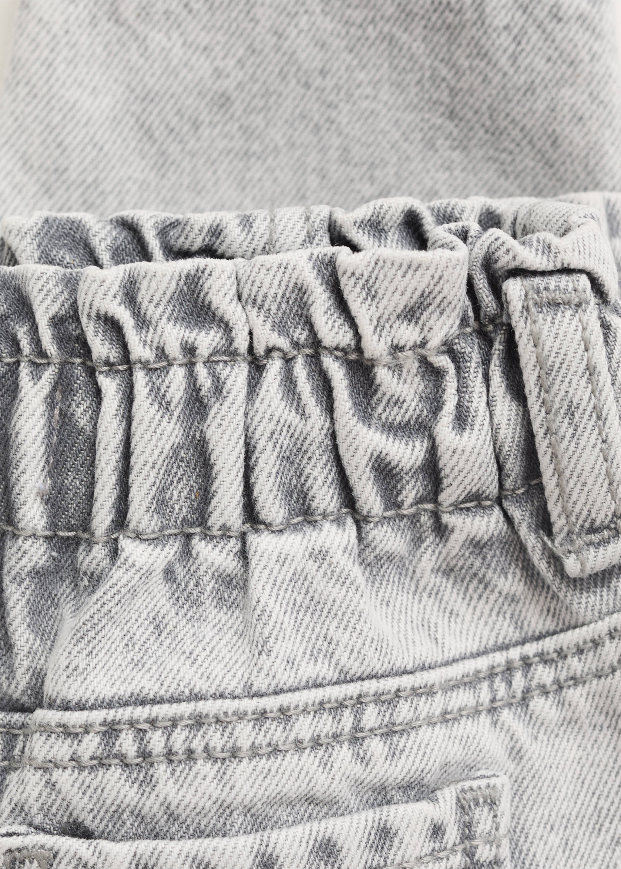 Paper bag jeans with buttons - Details of the article 0, Denim Grey. Ref: 17023285-00.
