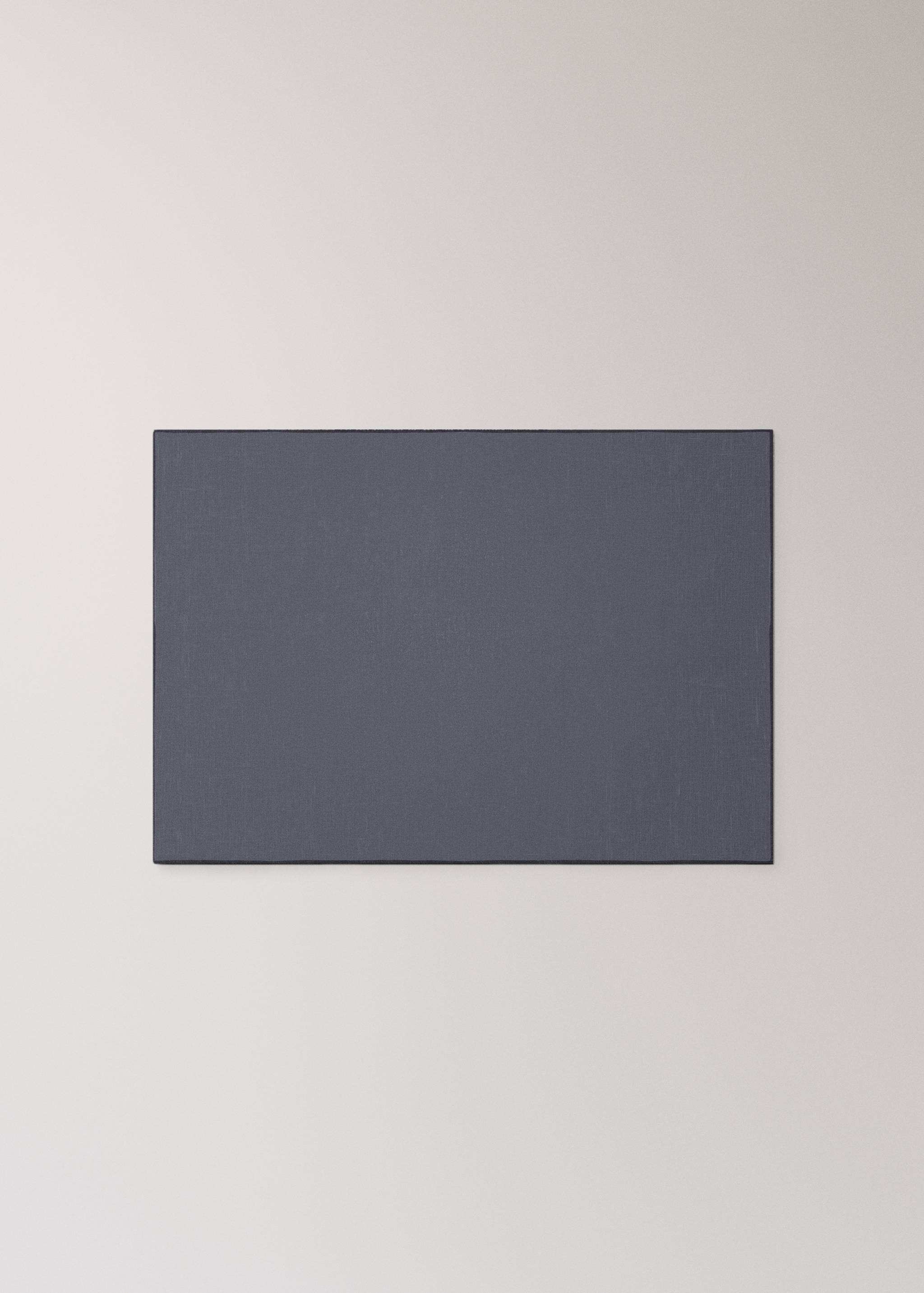 Dark blue-grey rectangular placemat.