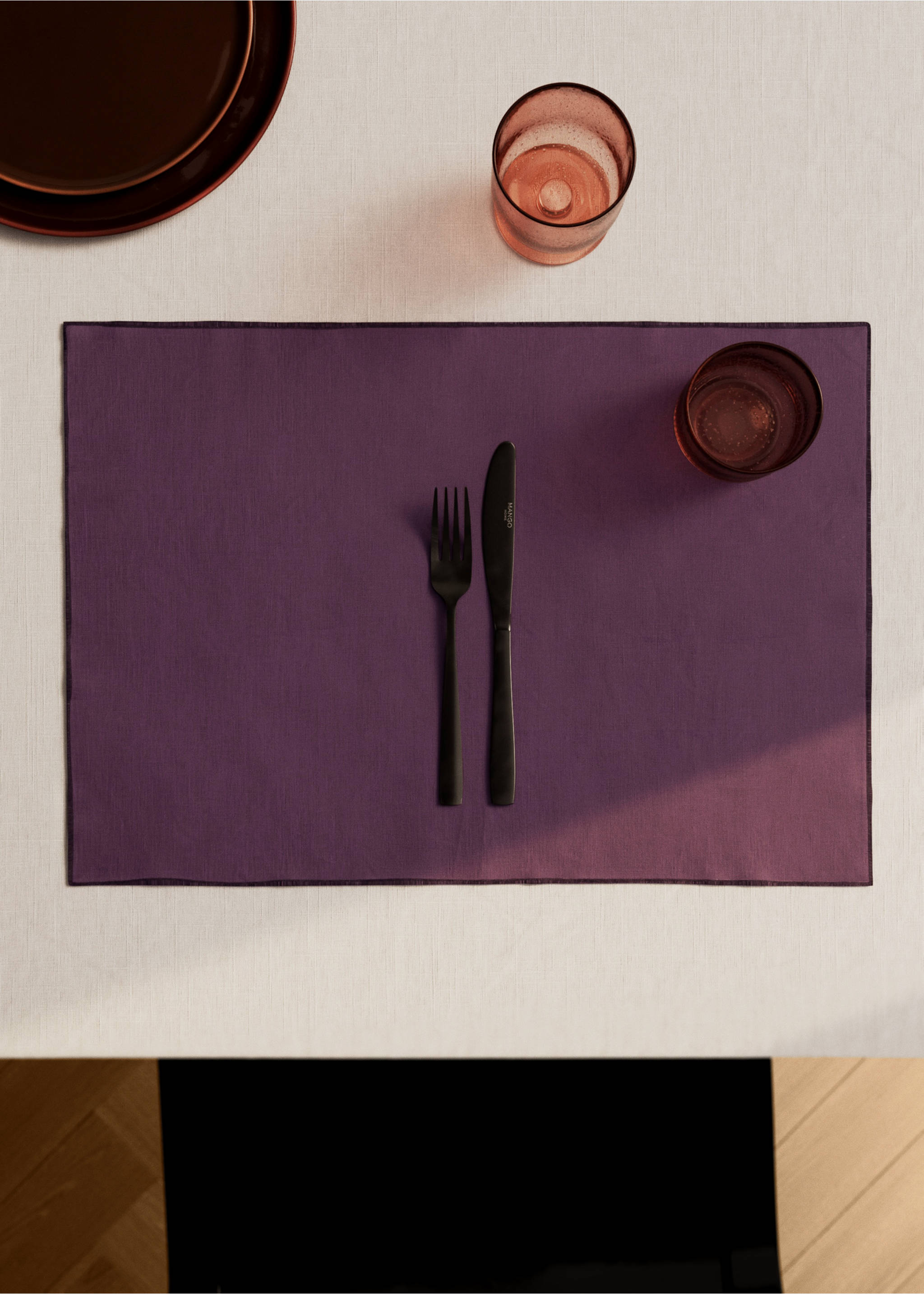 Rectangular purple place mat styled with cutlery and glassware., Blackberry. Ref: 17024133-00.
