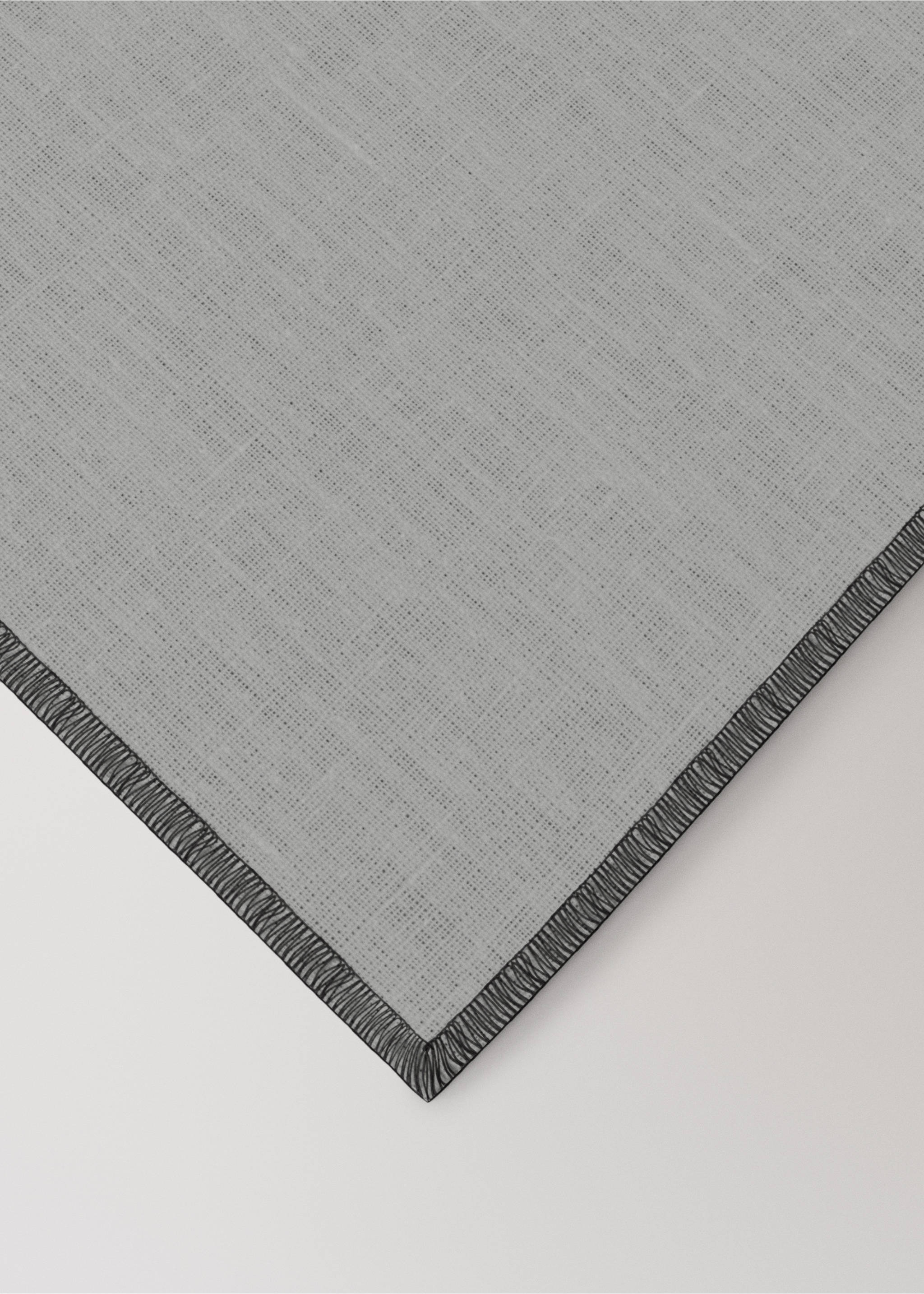 100% linen placemat with contrasting overlock stitching - Details of the article 2, Grey. Ref: 17024134-00.