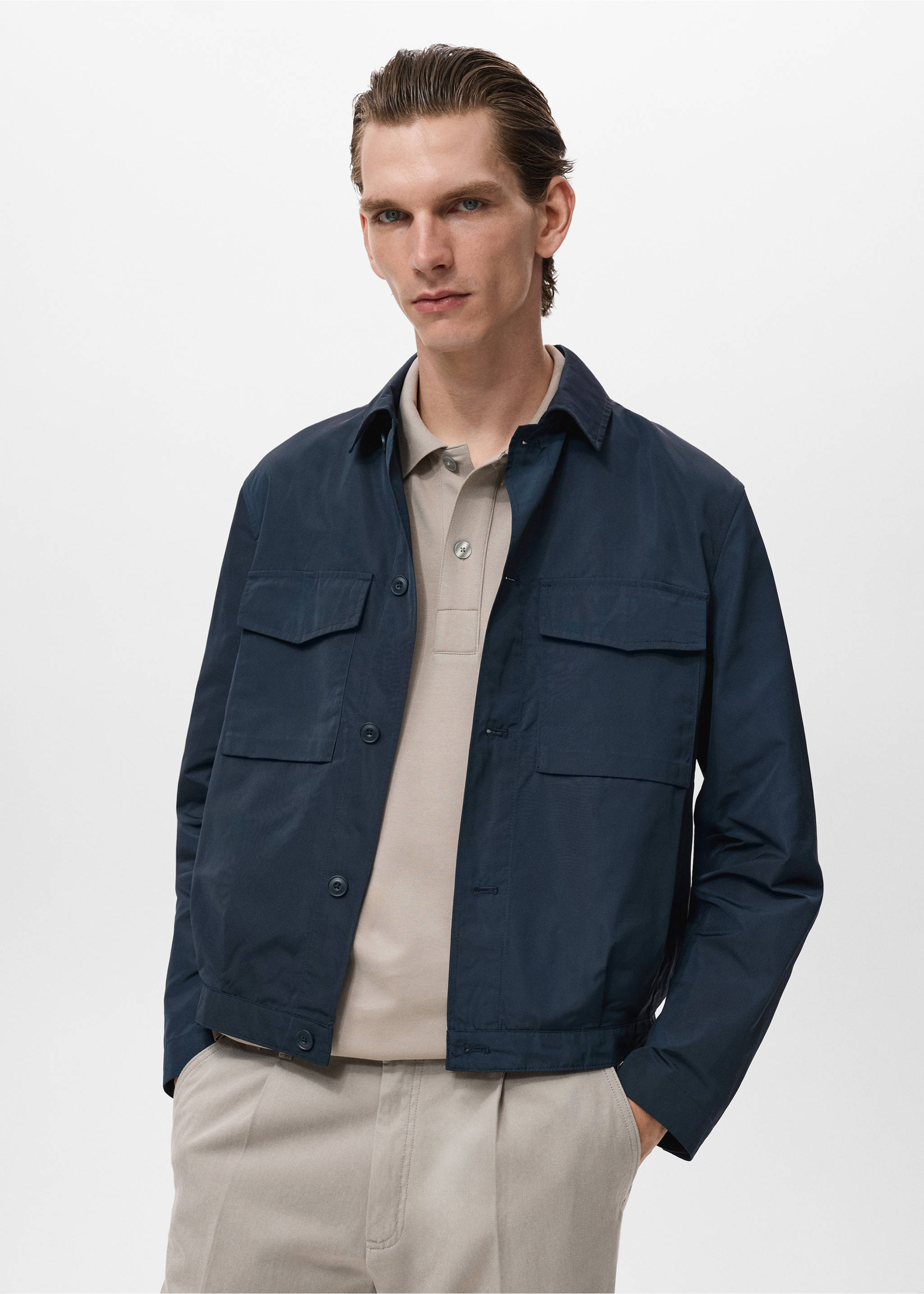 Water-repellent jacket with pockets - Medium plane, Petrol Blue. Ref: 17025140-00.