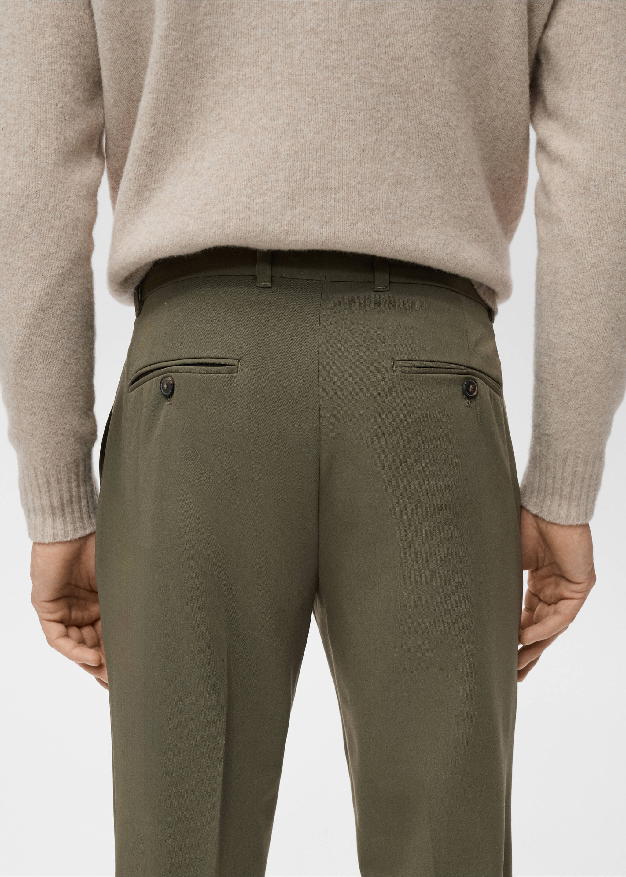 Dark khaki trousers from the back, worn with a beige jumper., Khaki. Ref: 17025147-00.