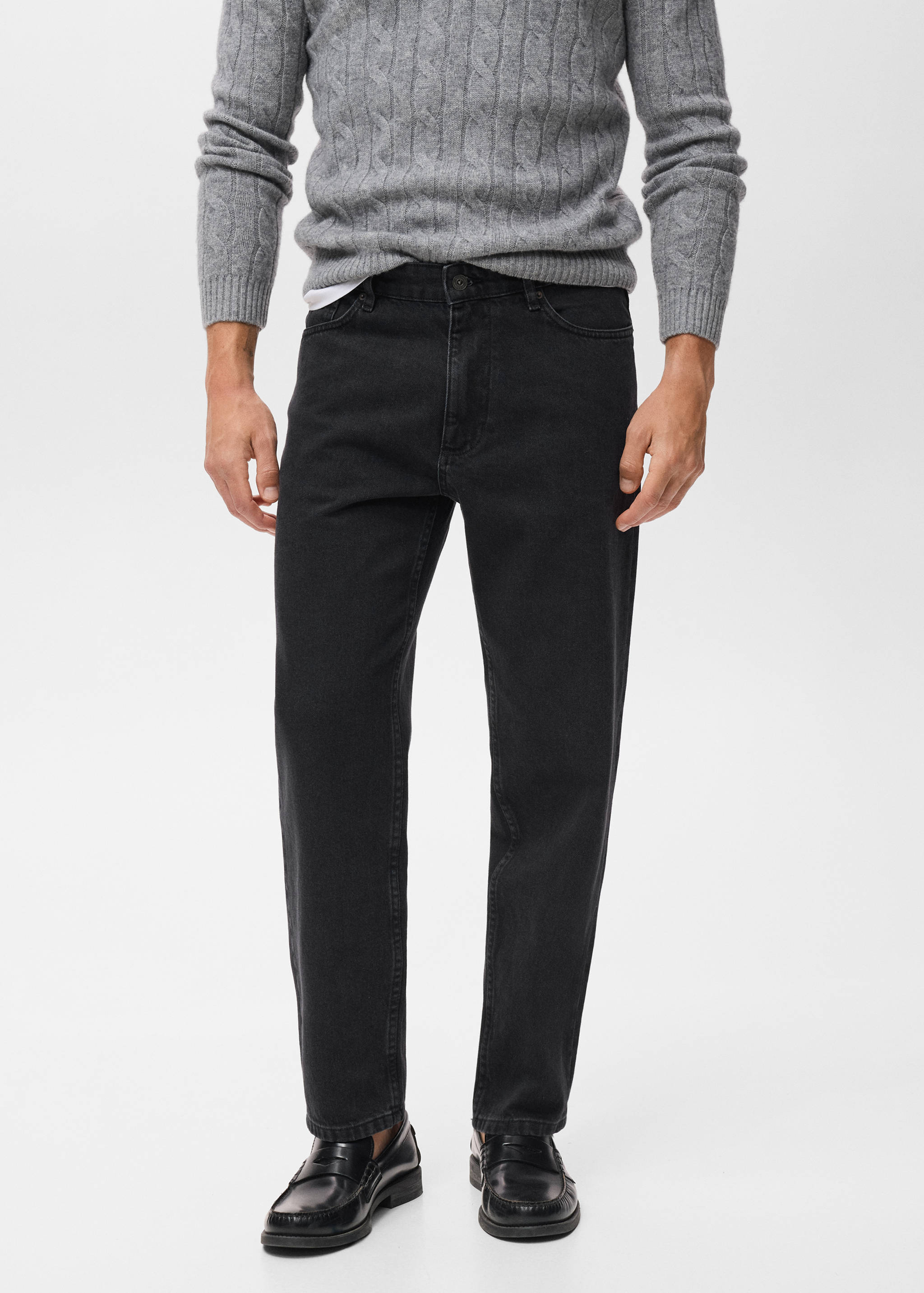 Black denim trousers with a classic fit and five-pocket design.