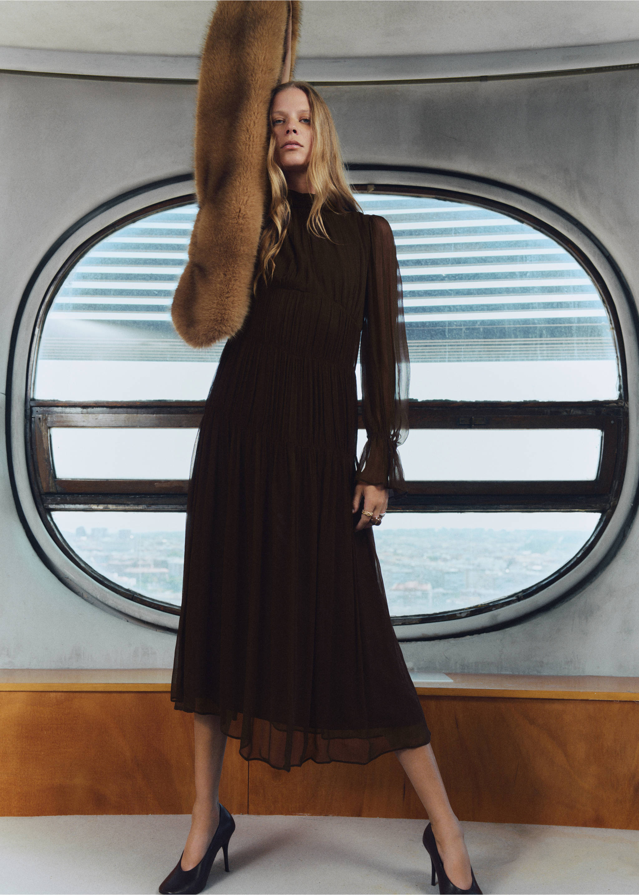 Dark brown midi dress with a high neck, sheer long sleeves, and a smocked bodice., Chocolate. Ref: 17025815-00.