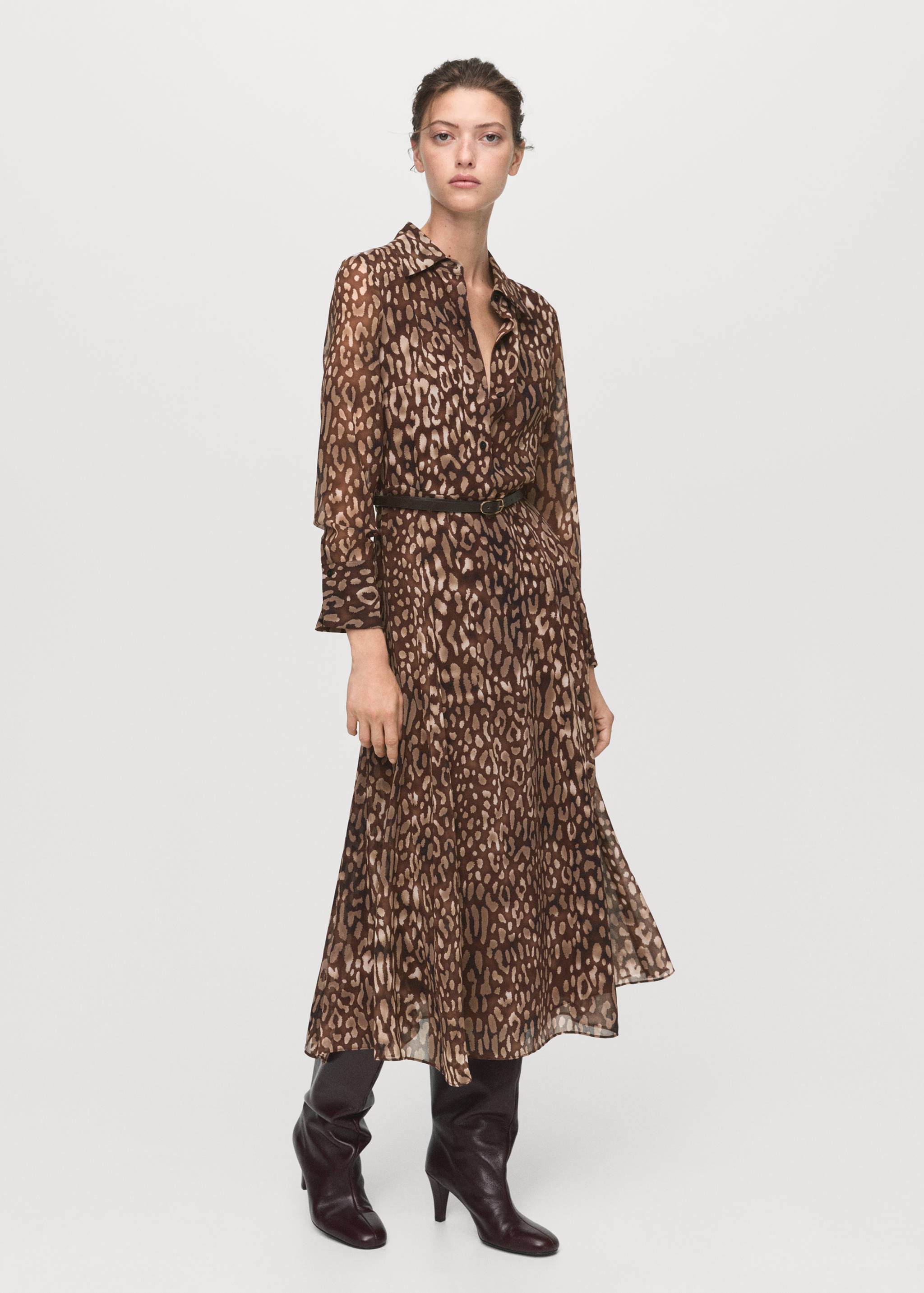 Brown animal print midi shirt dress with long sleeves and a collar, styled with a thin belt.