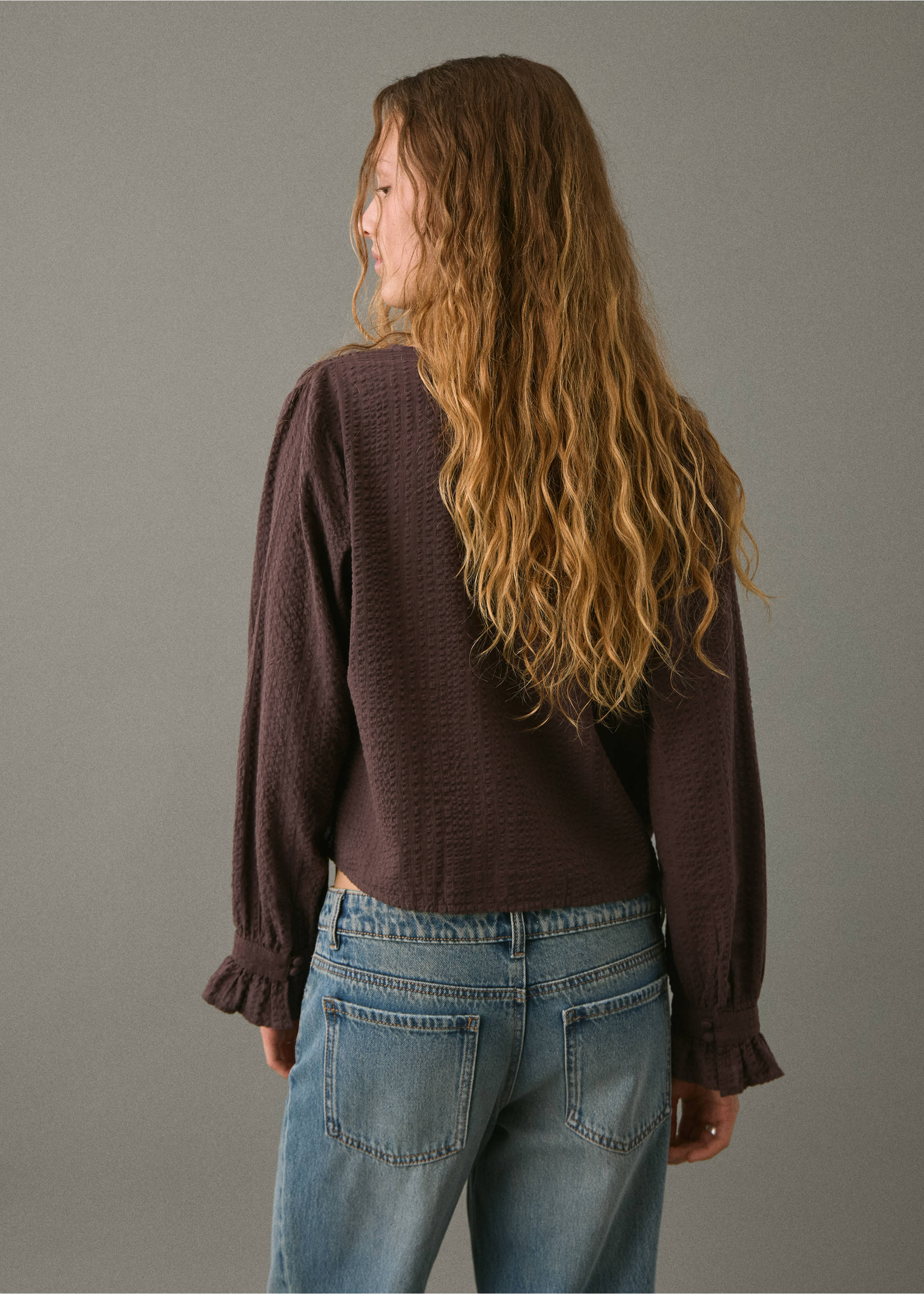 Back view of a dark plum blouse with textured fabric and long sleeves., Brown. Ref: 17026337-00.