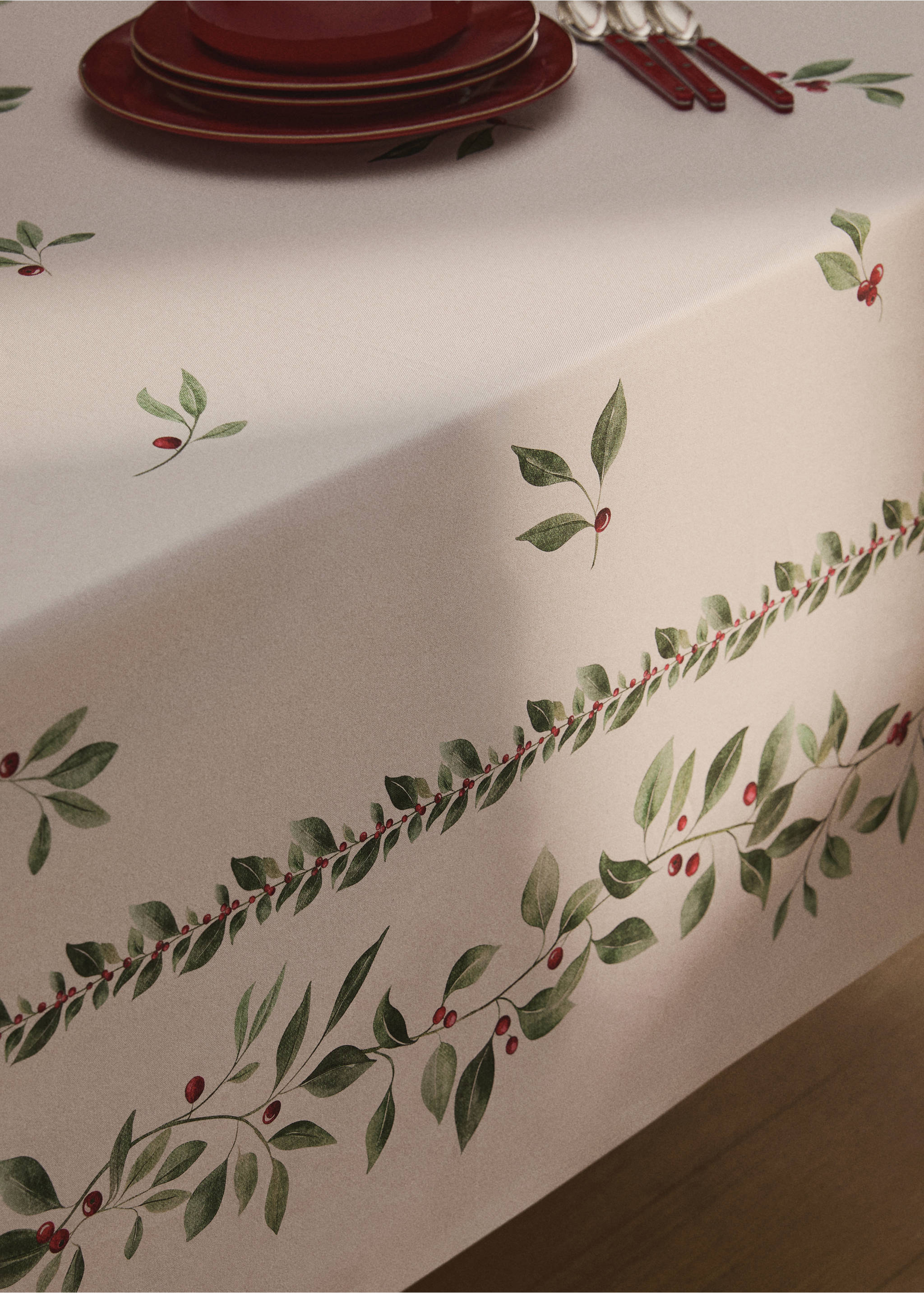 Cream tablecloth with a botanical green leaf and red berry print., Ecru. Ref: 17027795-00.