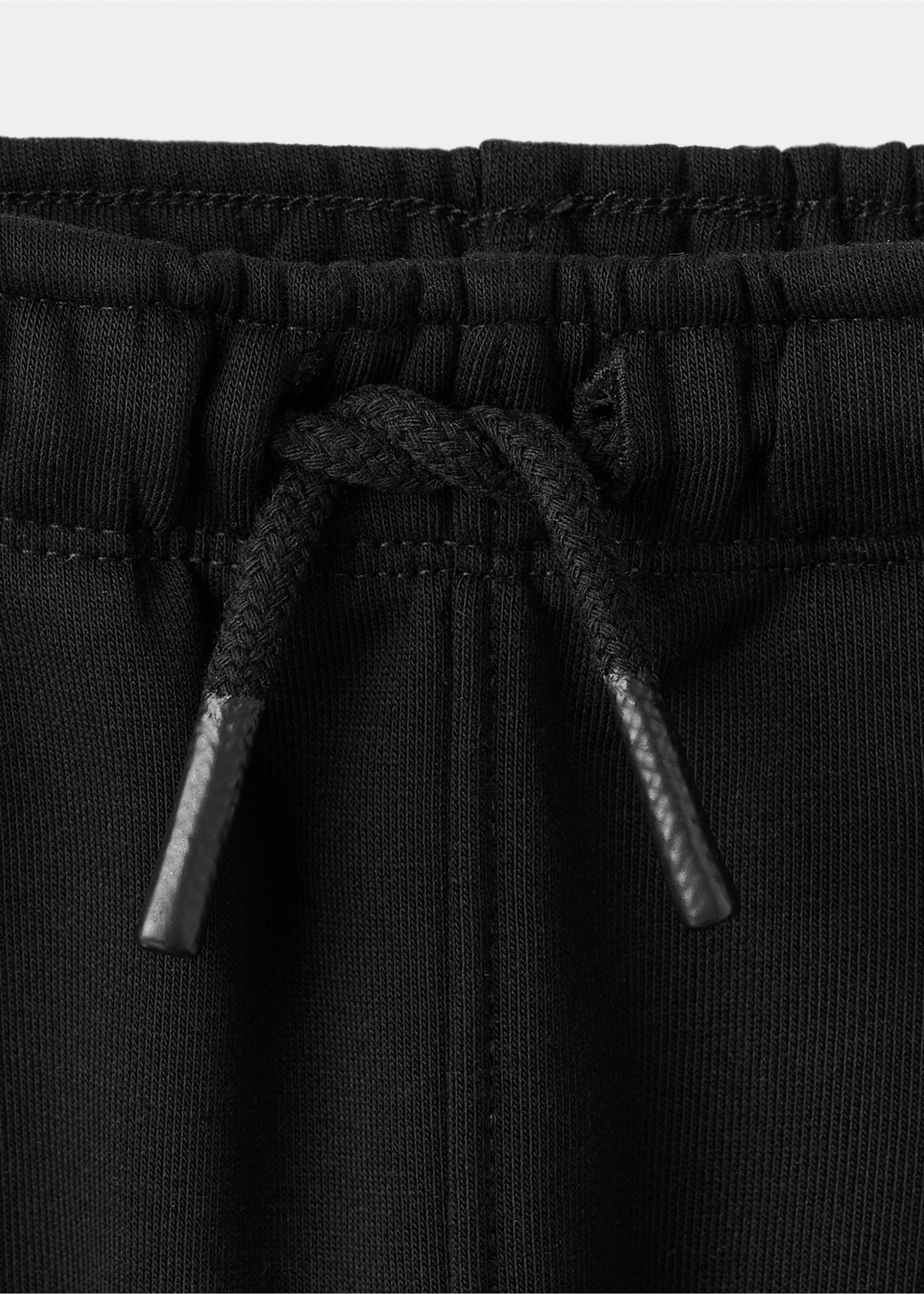 Cargo joggers with drawstring - Details of the article 8, Black. Ref: 17027901-00.