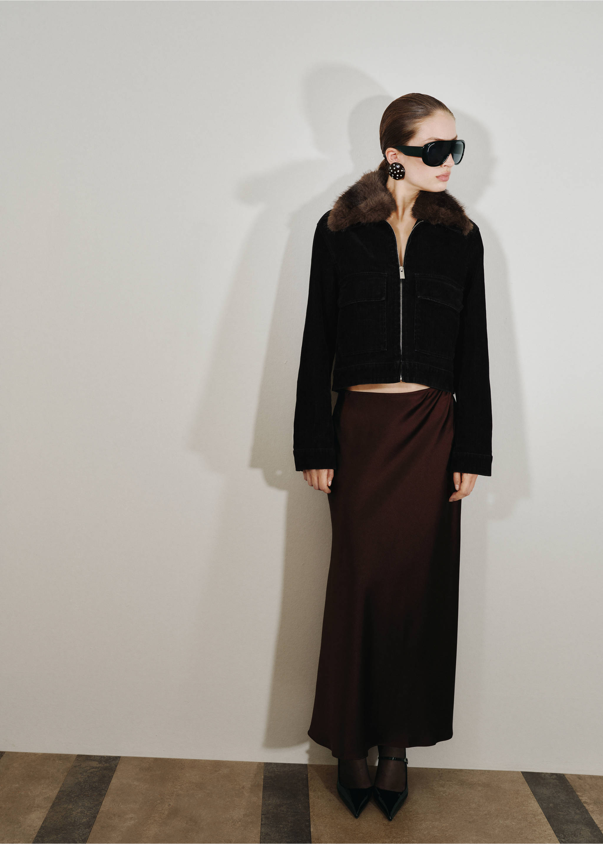 Black cropped jacket with a brown faux-fur collar worn with a dark satin skirt, Black. Ref: 17029099-00.