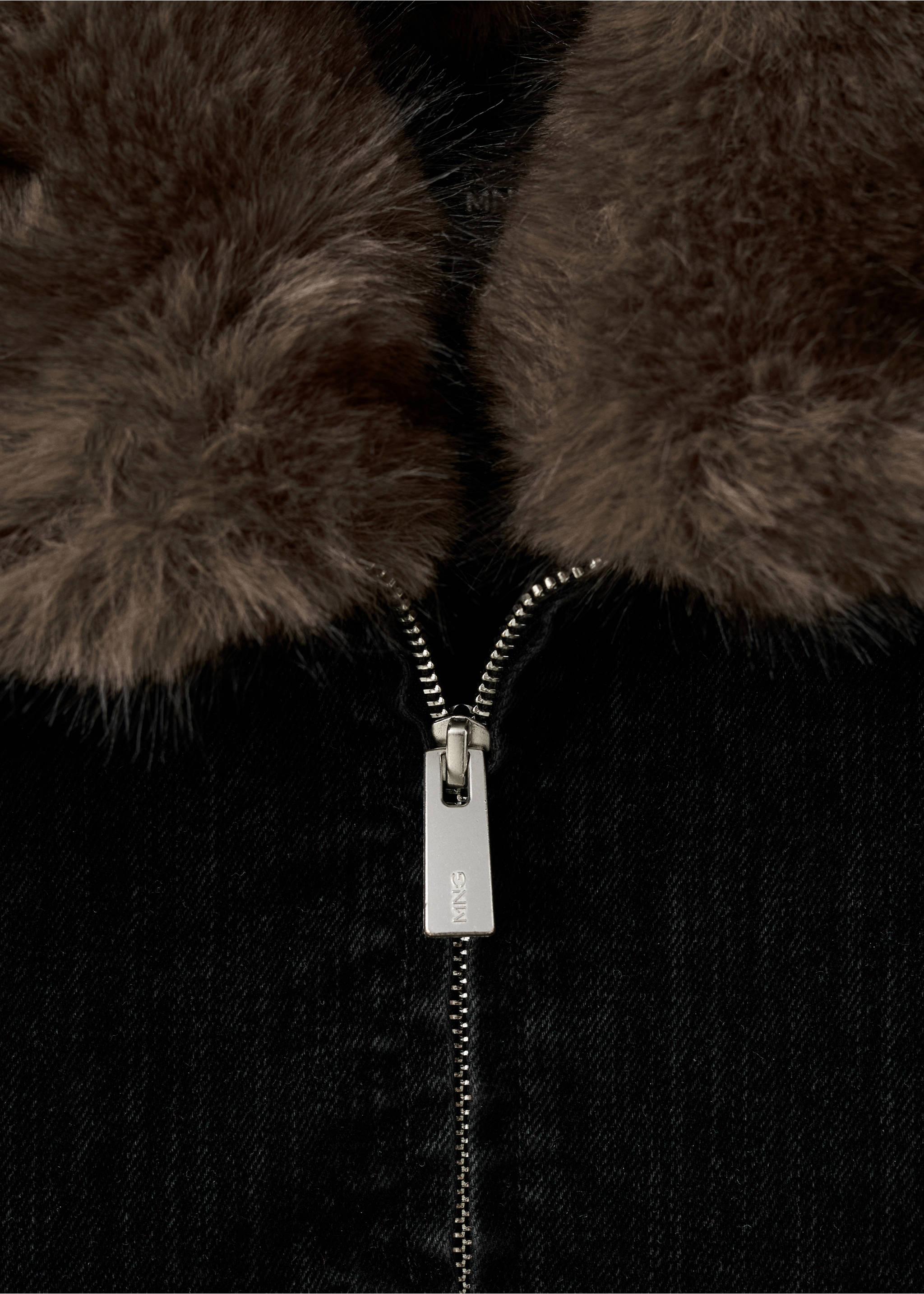 Jacket fabric detail showing a brown faux-fur collar and silver zip., Black. Ref: 17029099-00.