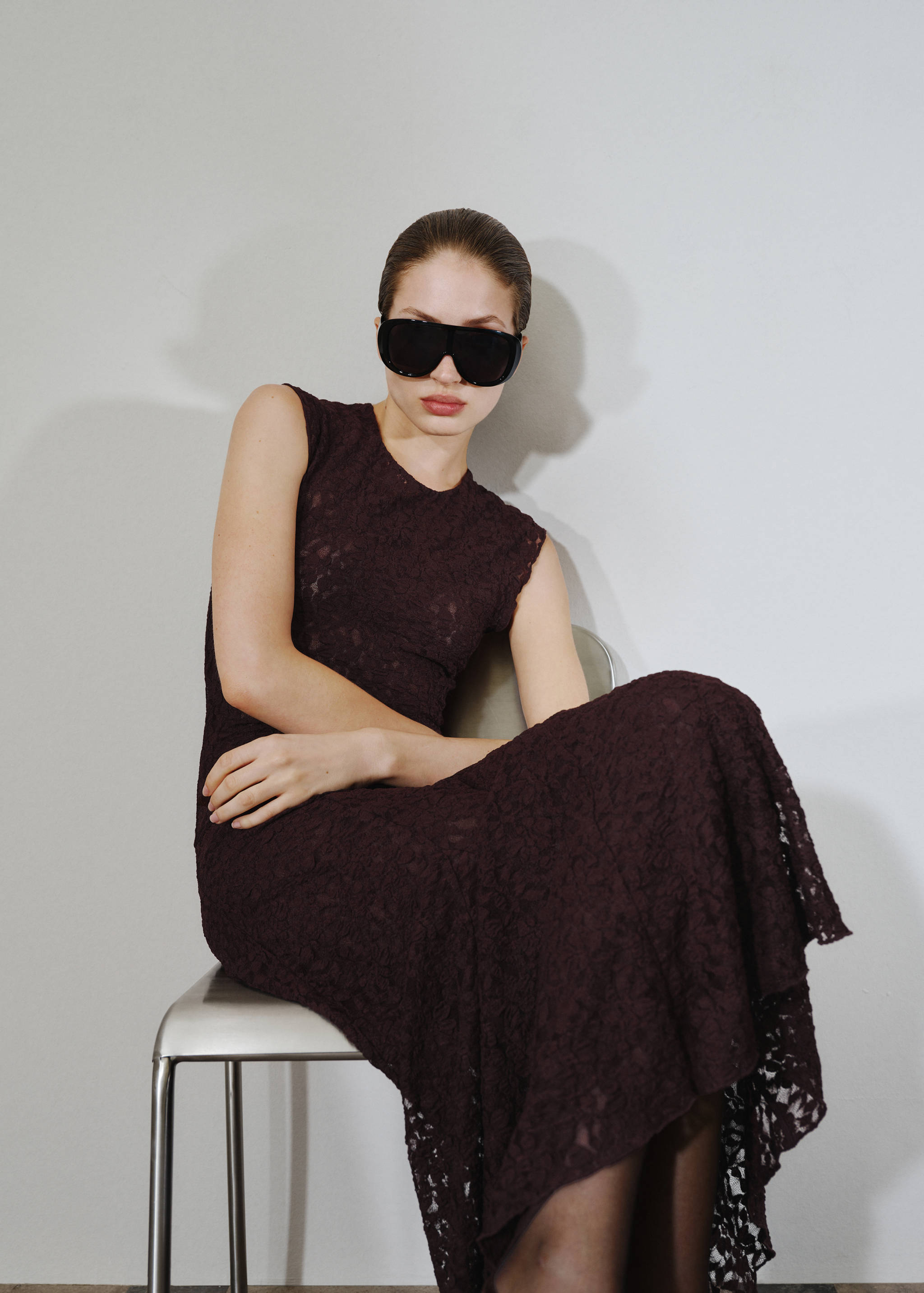 Dark plum sleeveless lace midi dress with a rounded neckline.