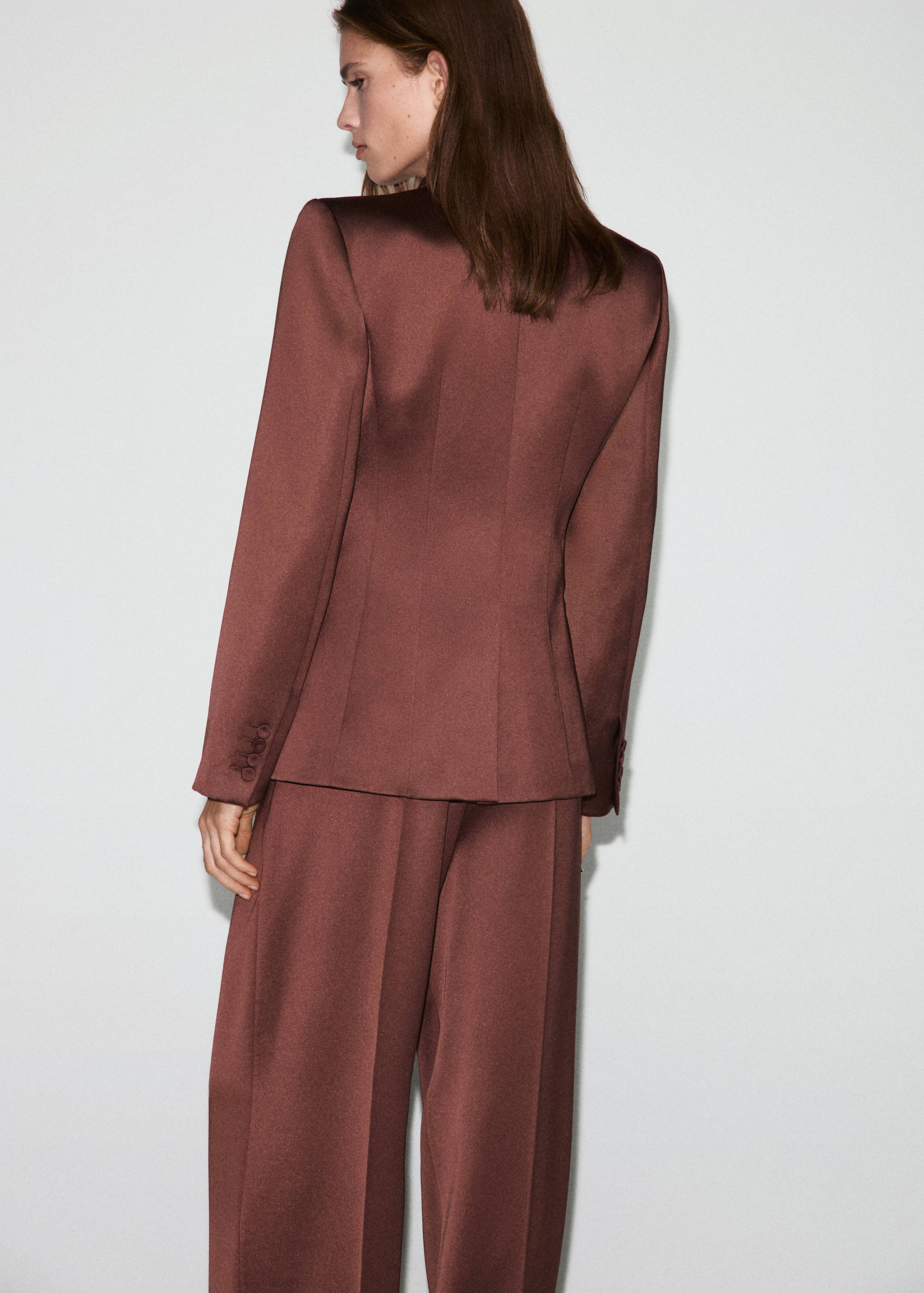 Brown tailored blazer, back view, worn with matching trousers