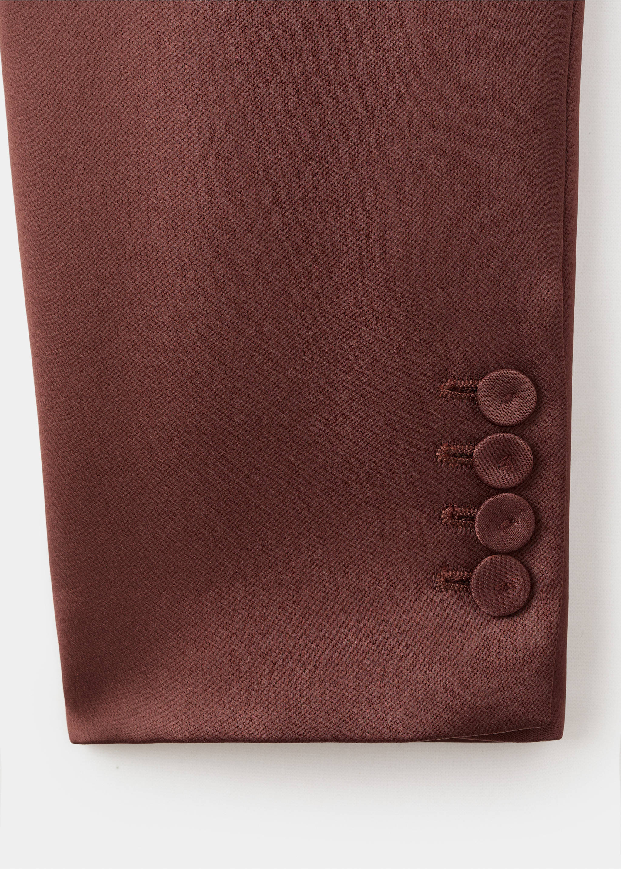 Close-up of a burgundy blazer cuff with four matching buttons., Brown. Ref: 17029408-00.