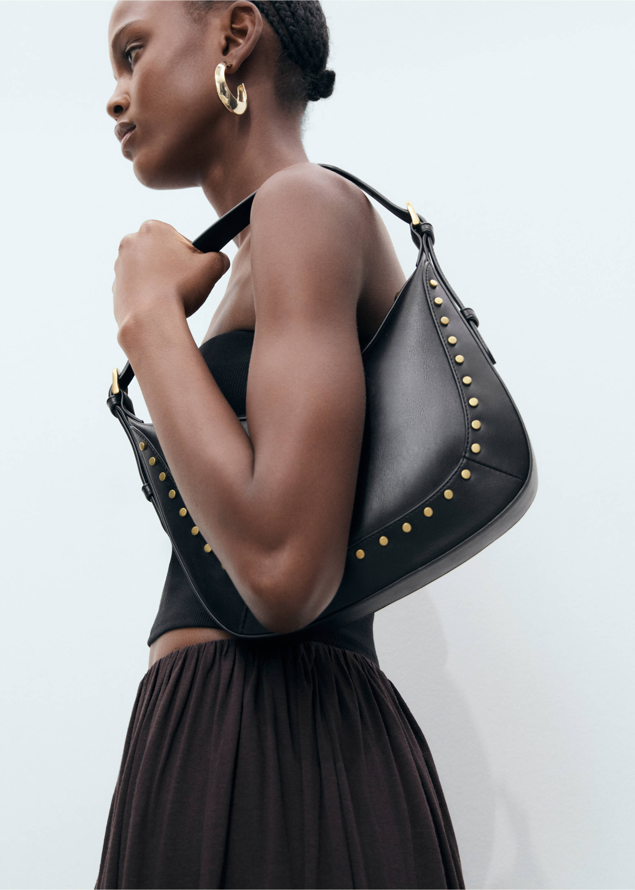 Small studded shoulder bag - General plane, Black. Ref: 17031139-00.