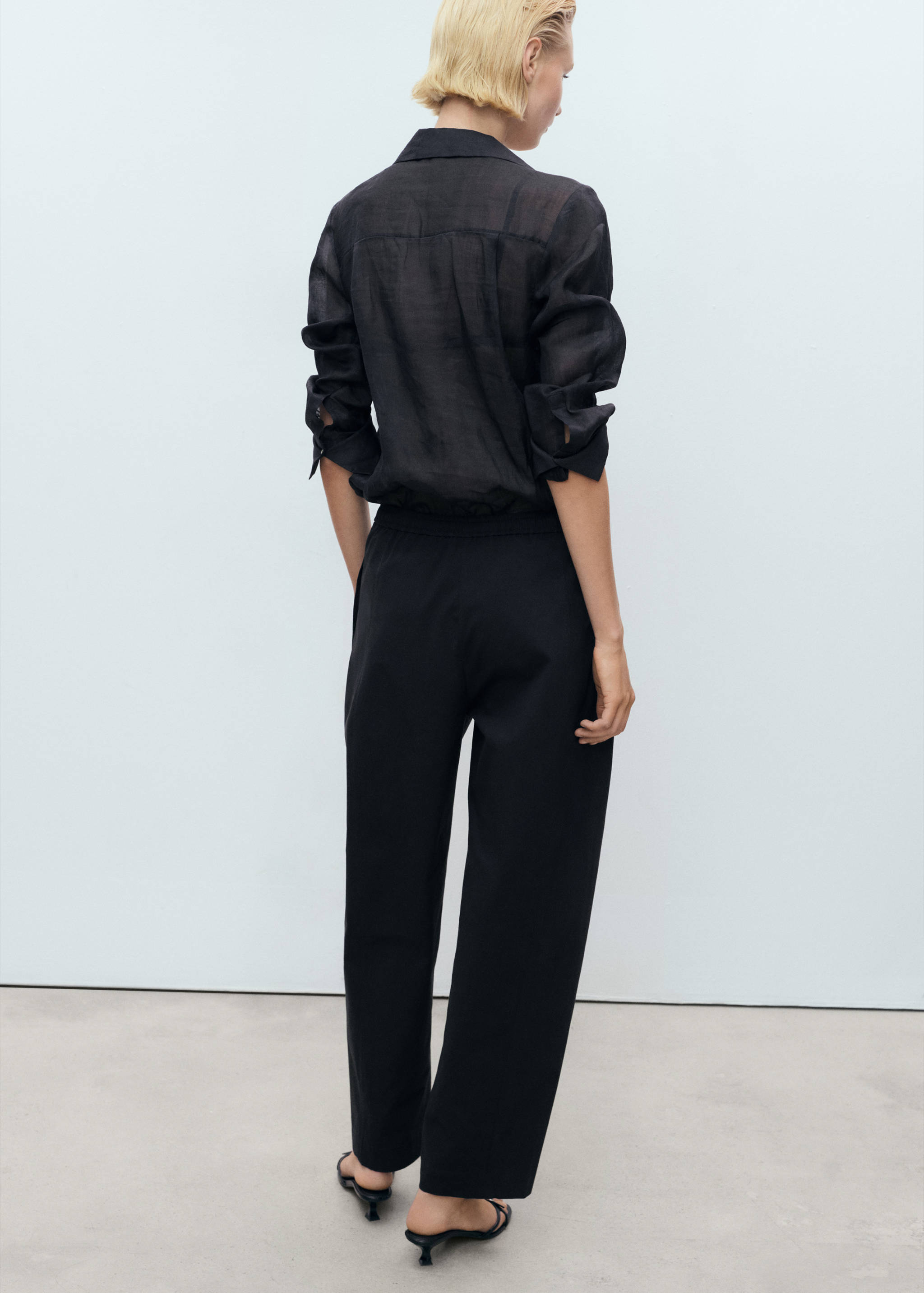 Elastic waist cotton trousers - Reverse of the article