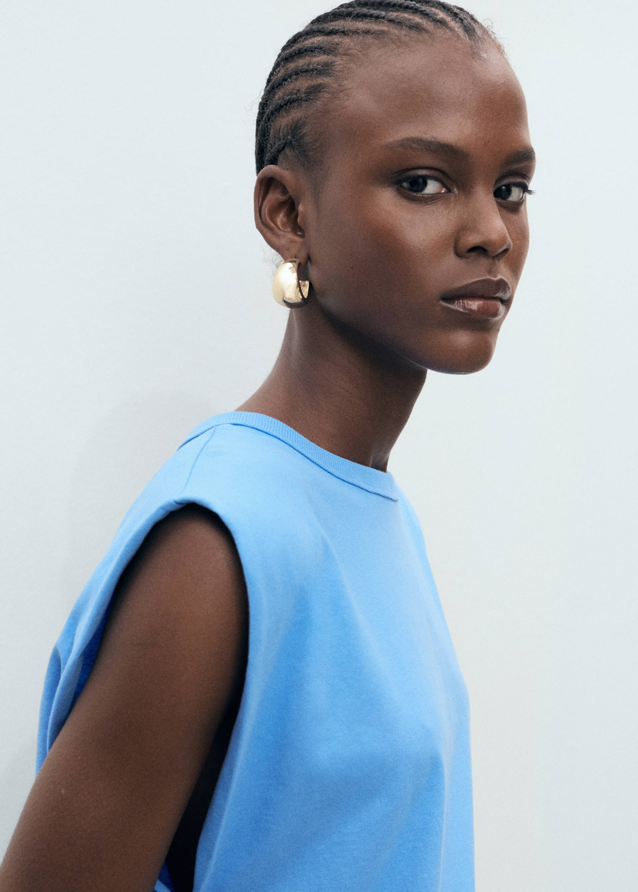 Tričko s ramenními vycpávkami a krátkým rukávem - Detail zboží 1