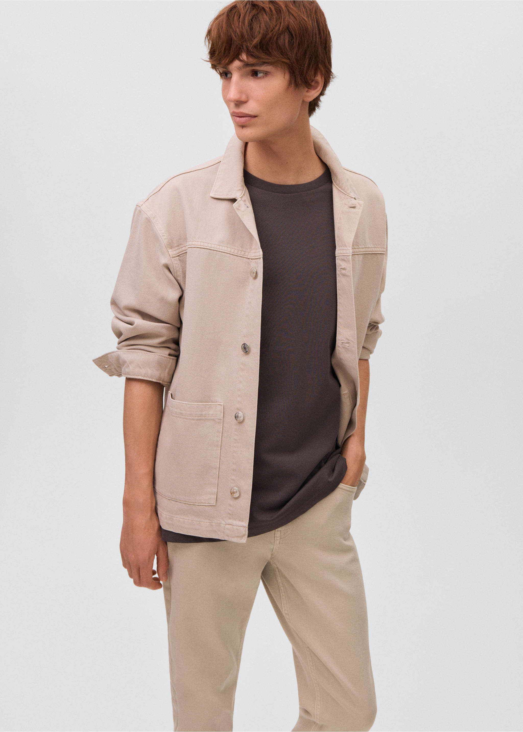 Beige denim jacket worn open over a dark grey t-shirt., Beige. Ref: 17031254-00.