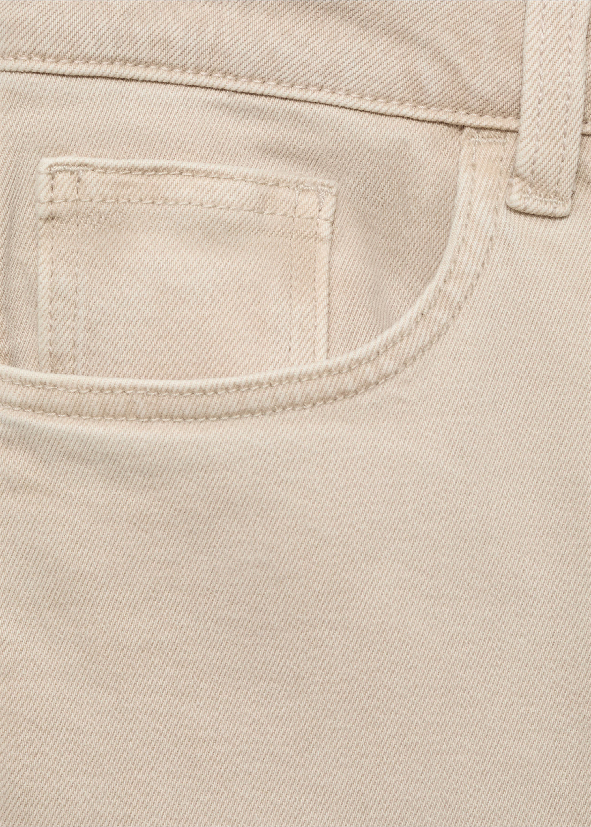 Close-up of beige denim fabric and pocket detail on trousers., Beige. Ref: 17031254-00.