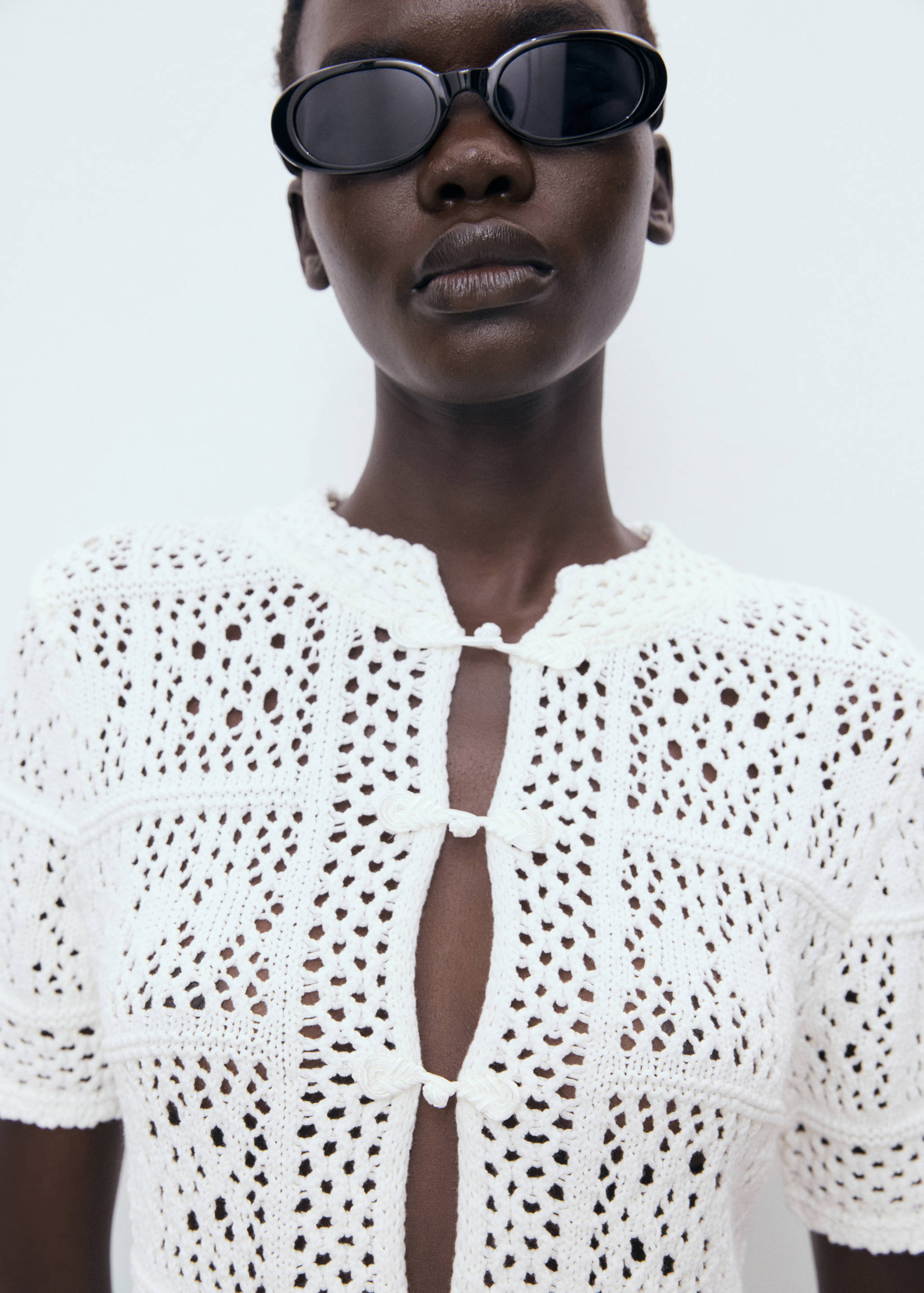 Short-sleeved crochet cardigan - Details of the article 1