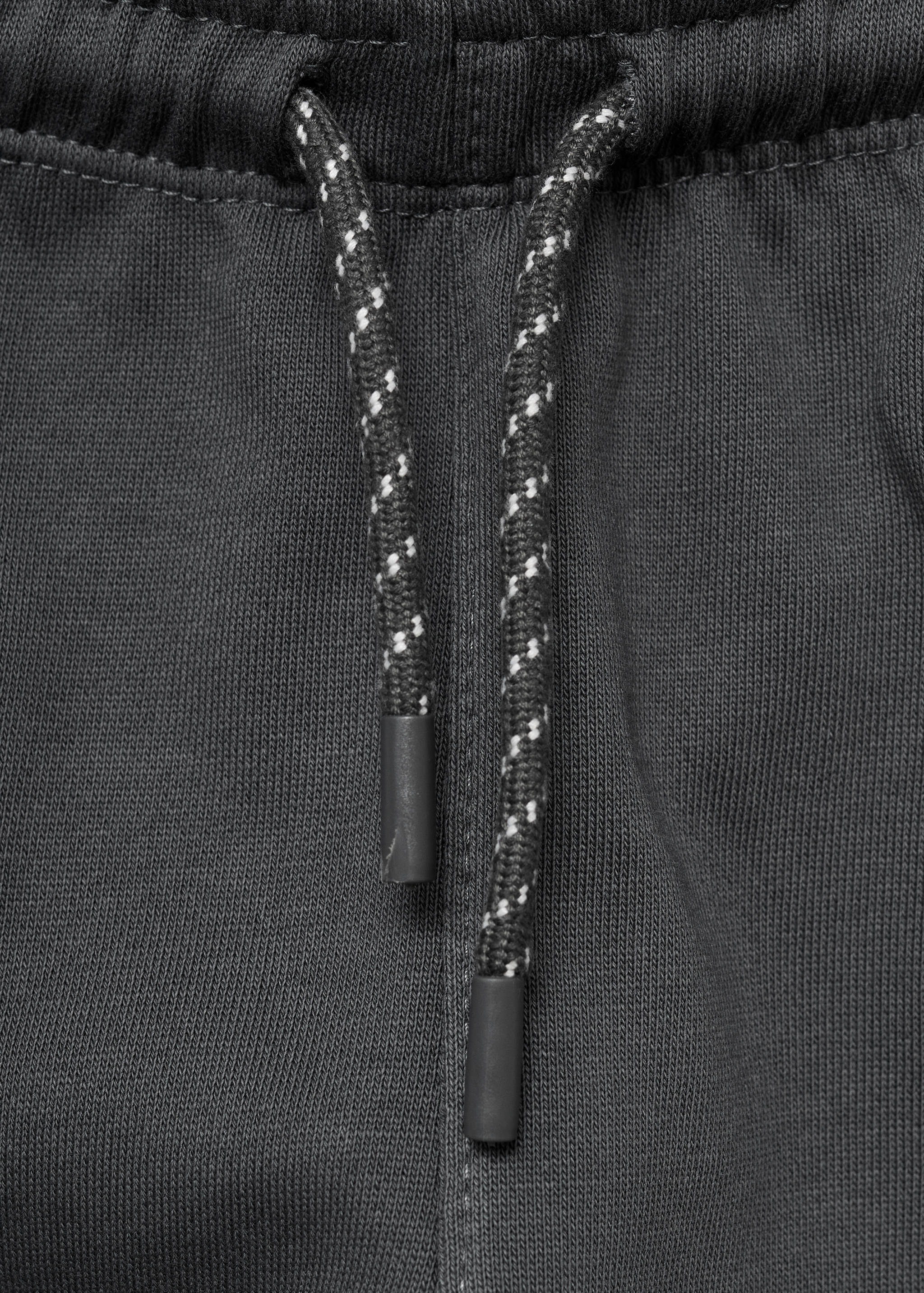 Cotton jogger-style trousers - Details of the article 0