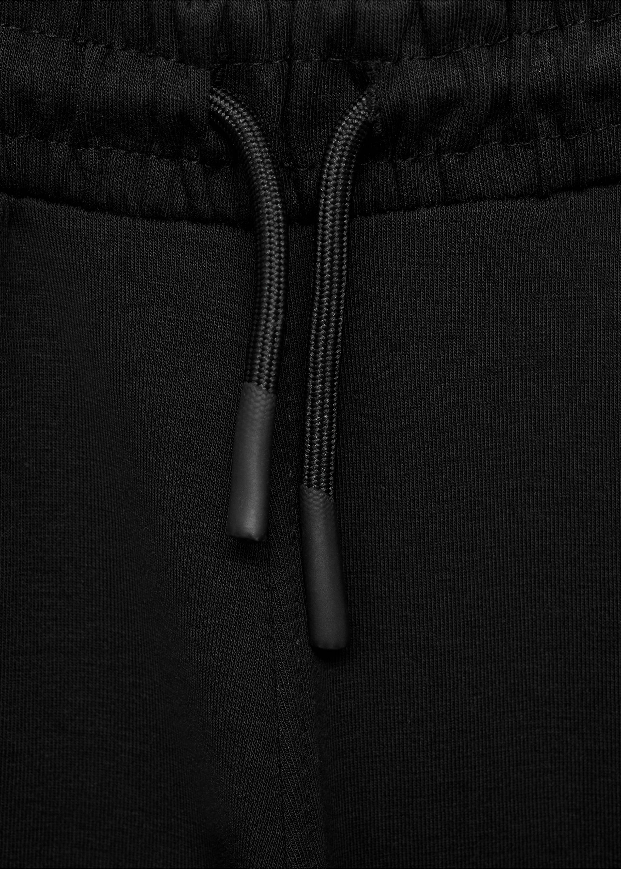 Joggers interlock - Detall de l'article 8, Negre. Ref: 17034419-00.