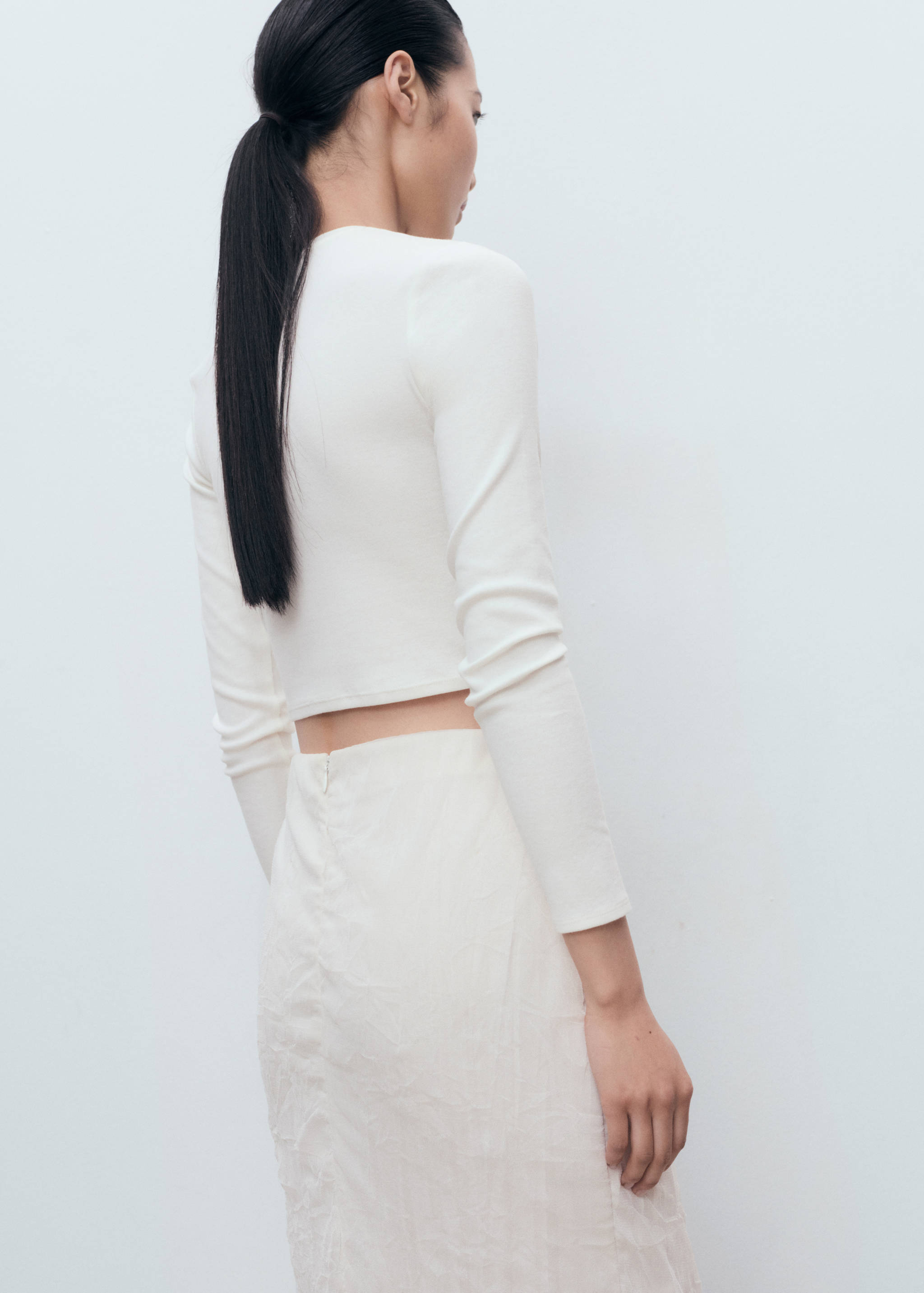 Long-sleeved cropped t-shirt - Reverse of the article