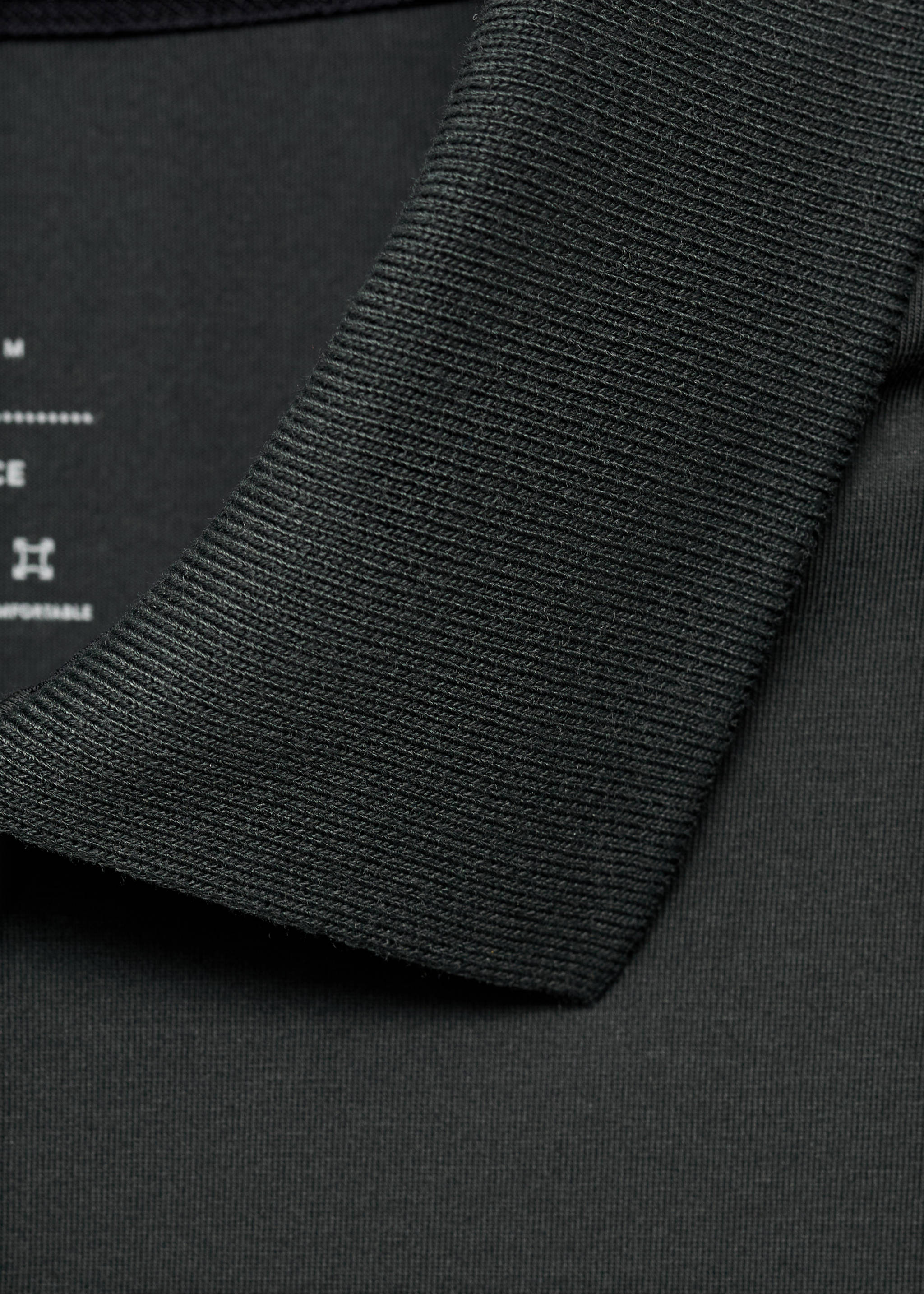 Slim-fit Thermolite® polo shirt - Details of the article 8, Dark Green. Ref: 17035977-00.