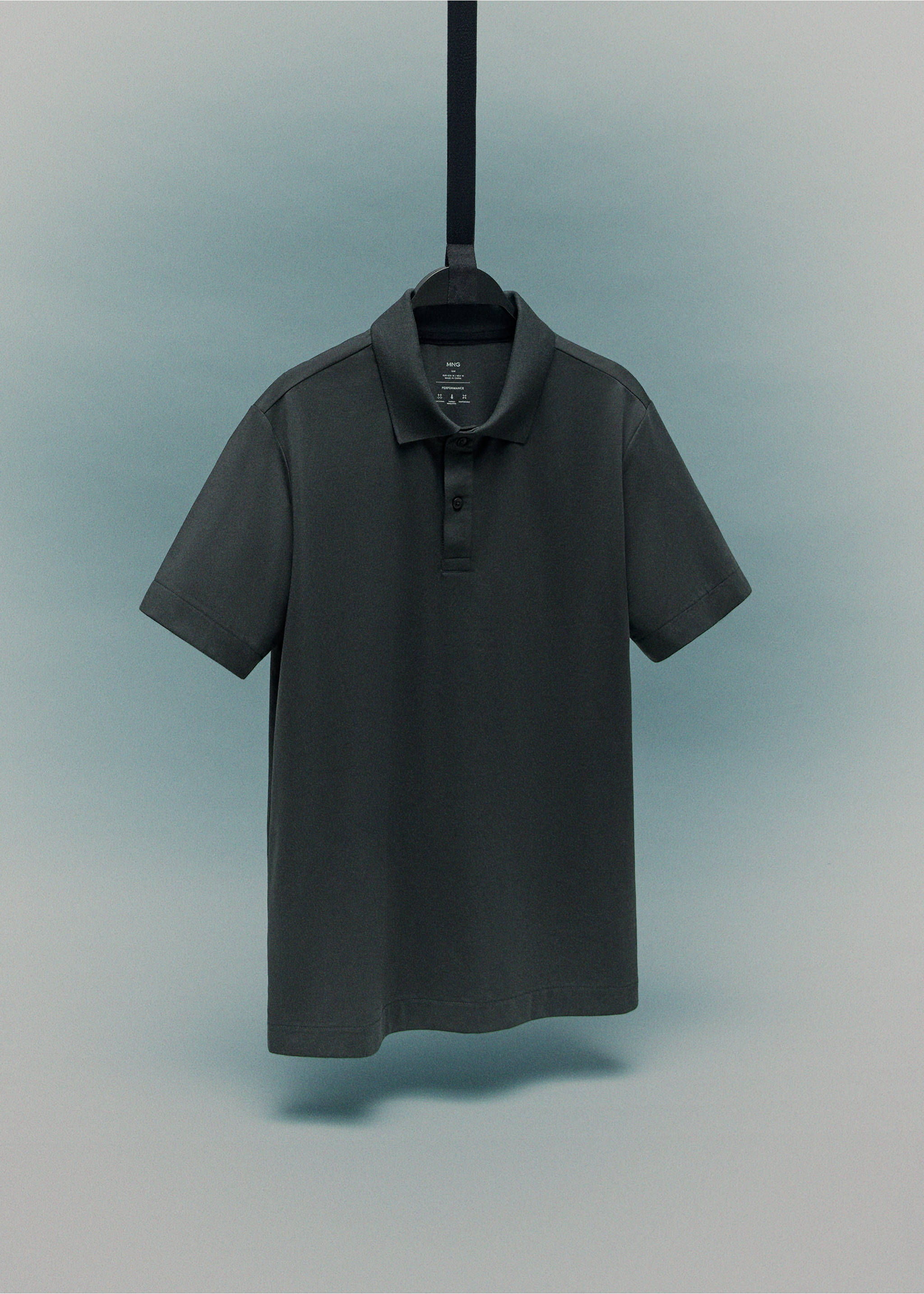 Slim-fit Thermolite® polo shirt - Details of the article 9, Dark Green. Ref: 17035977-00.