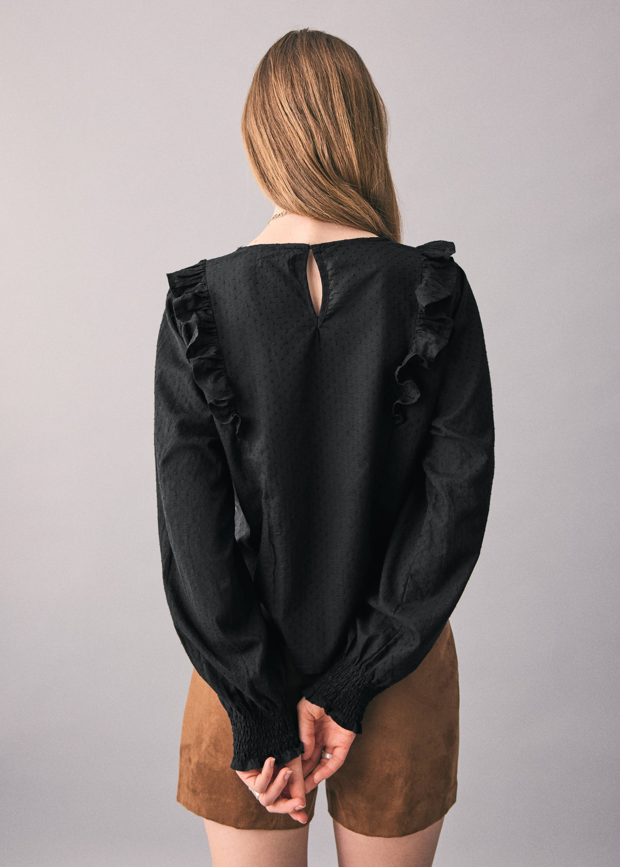 Broderad volangblus - Artikelns baksida