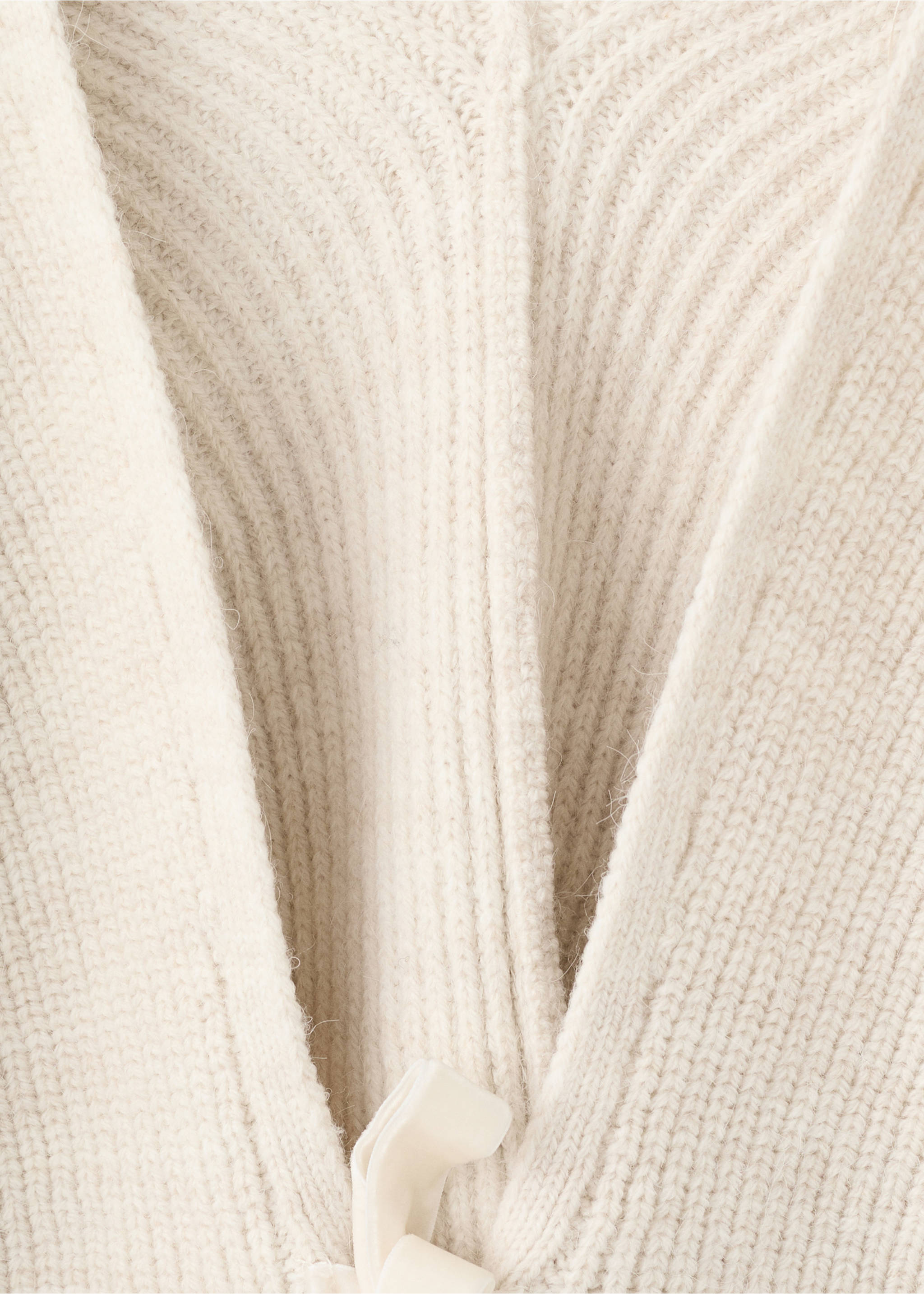 V-neck cardigan with bows - Details of the article 8, Beige. Ref: 17037815-00.