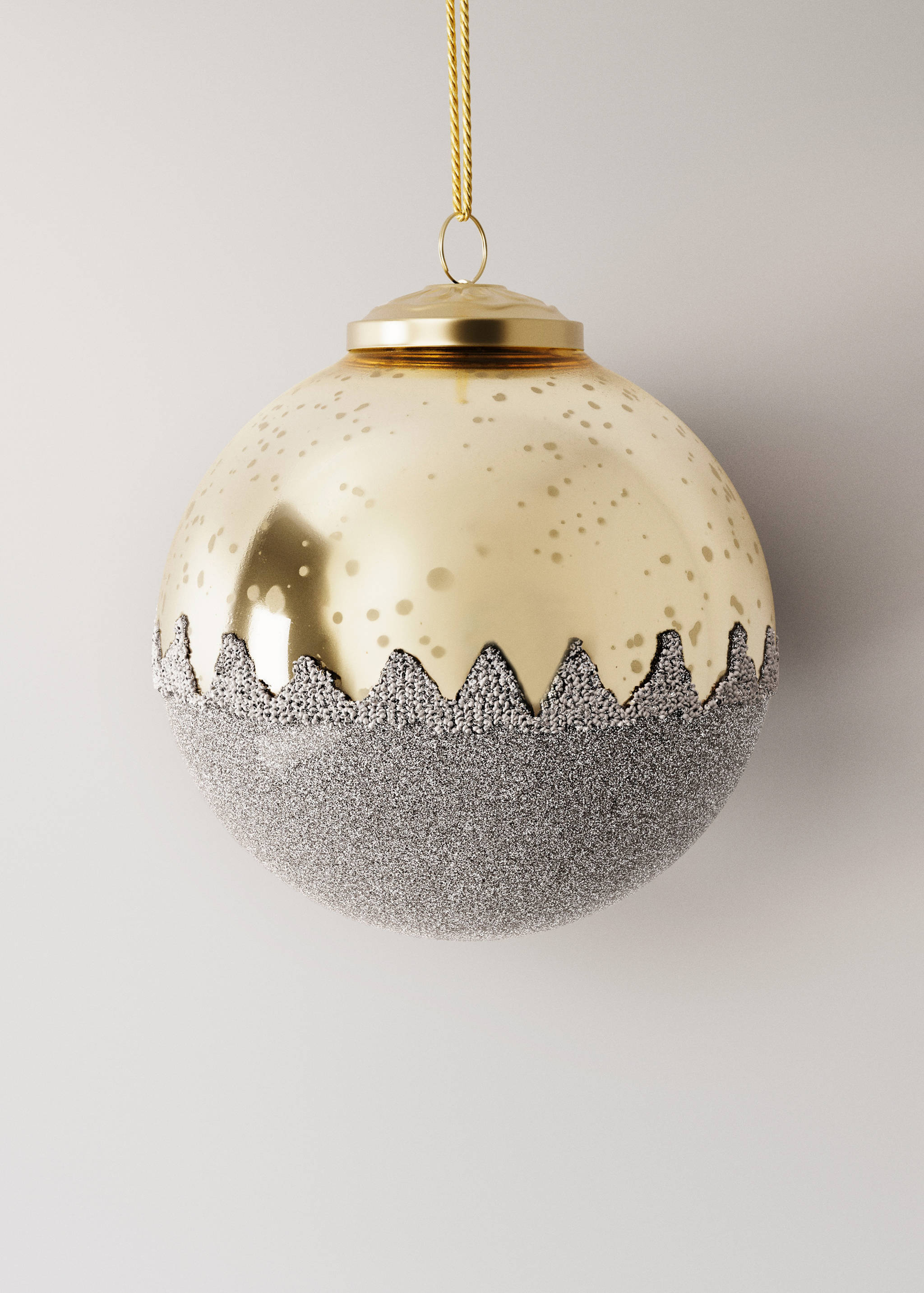 Gold and silver glitter Christmas bauble ornament with a textured finish.