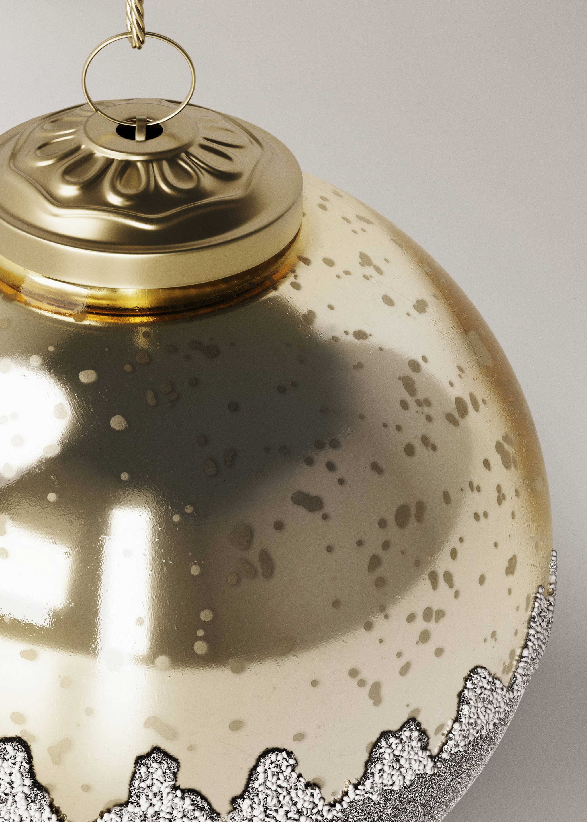 Gold mercury-glass Christmas ornament with a metallic cap and textured silver glitter base.
