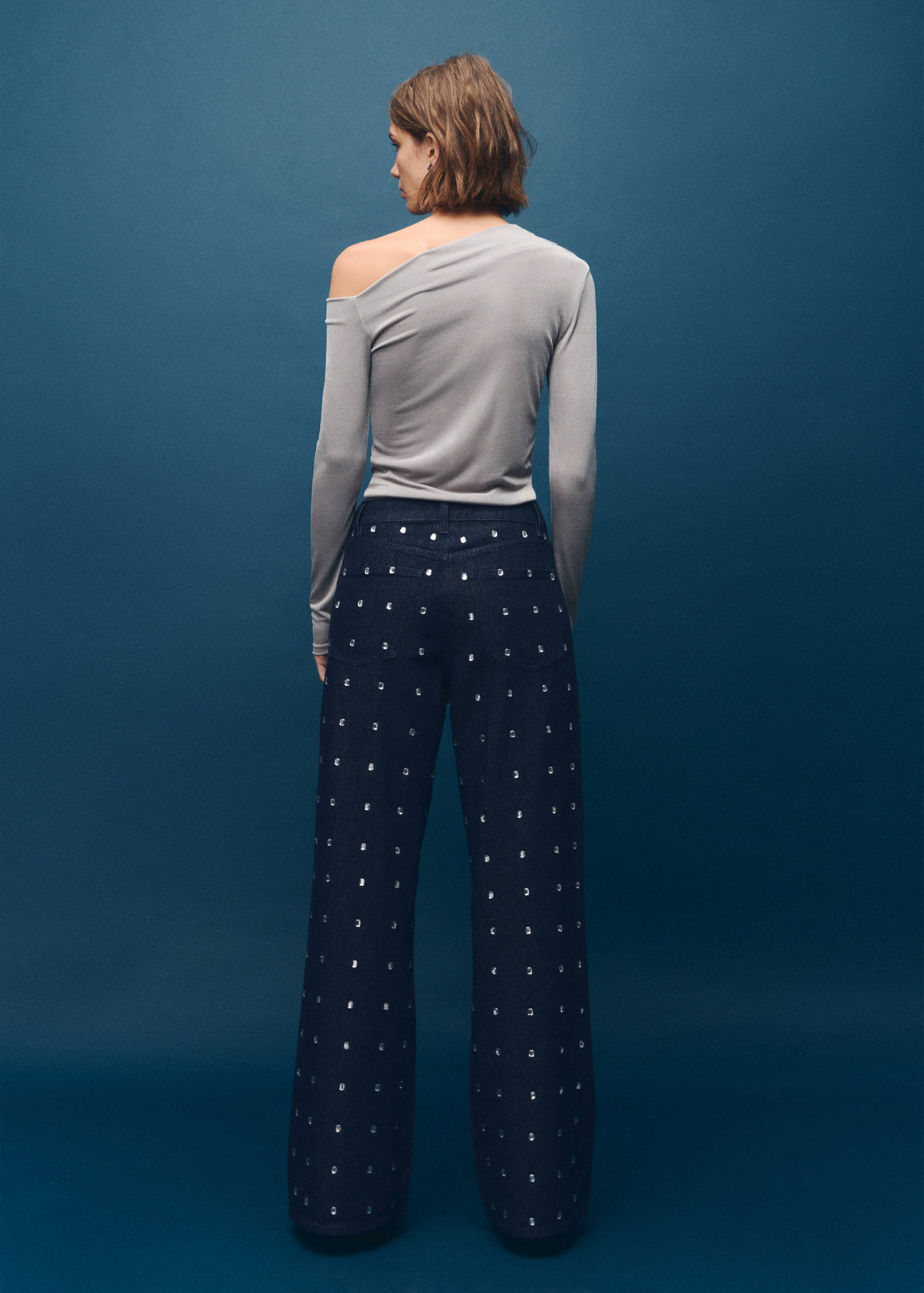 Wide-Leg-Jeans mit Kristallverzierungen - Rückseite des Artikels