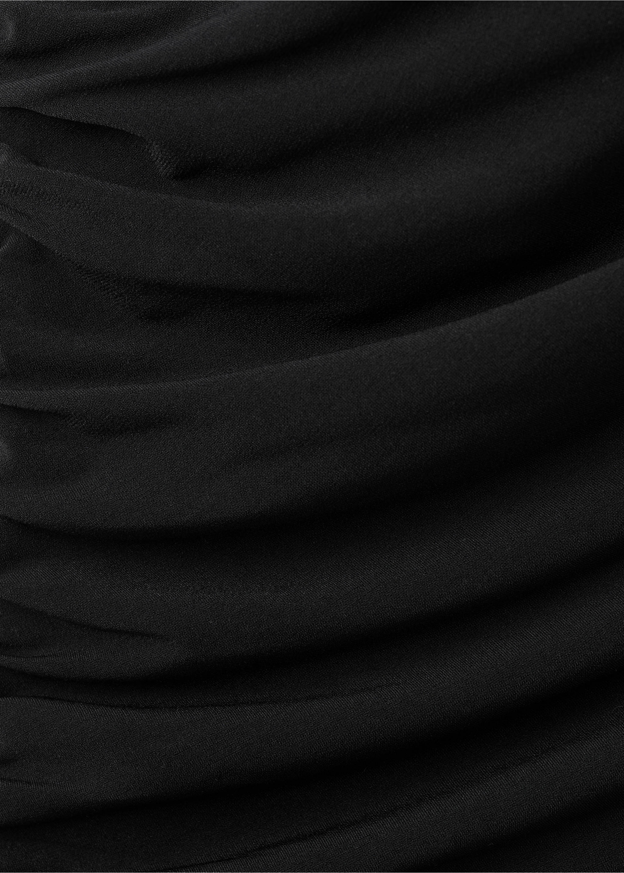 Close-up of black dress fabric featuring draped ruching., Black. Ref: 17039115-00.