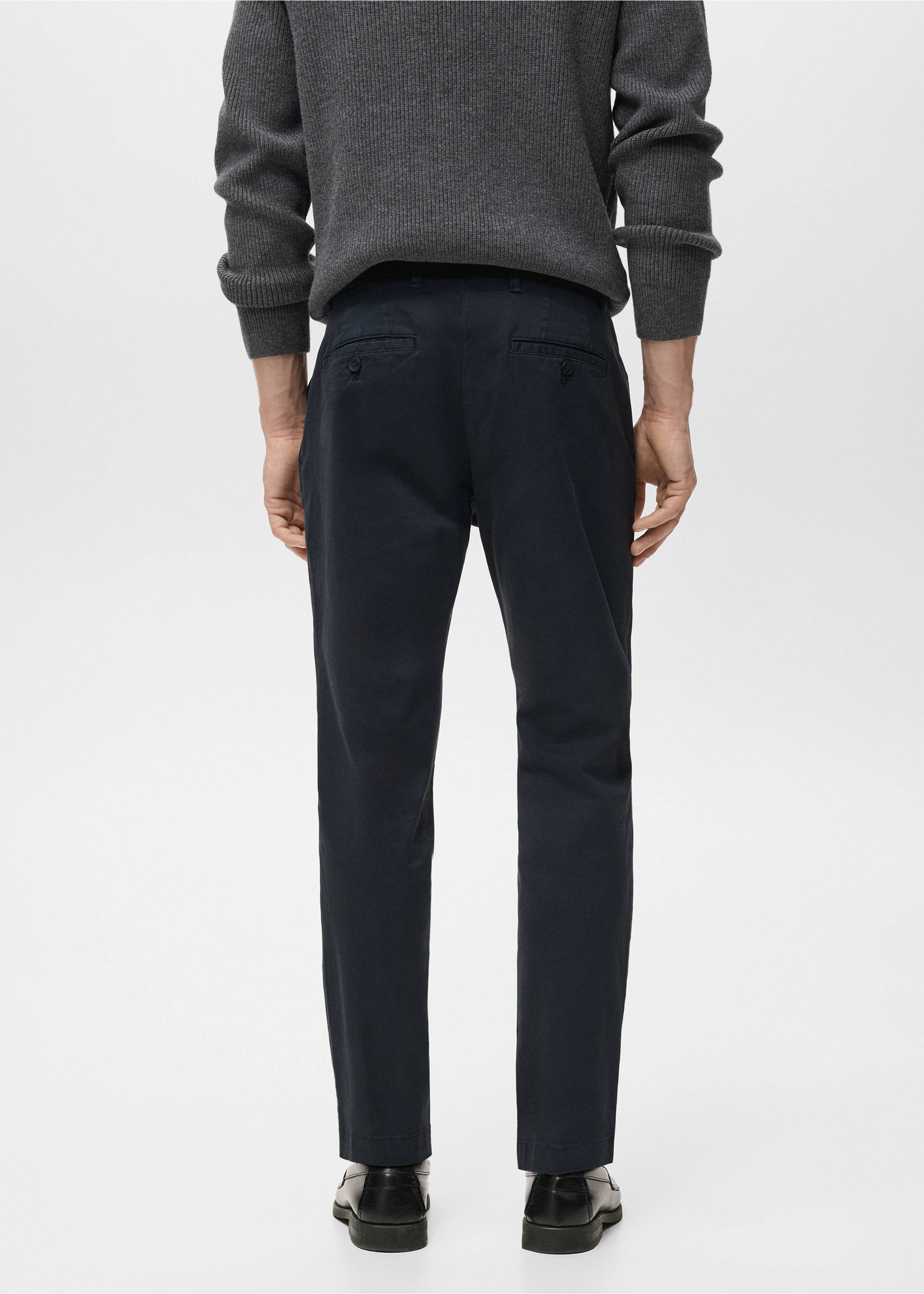 Navy trousers shown from the back, paired with a grey sweater., Dark Navy. Ref: 17041144-00.