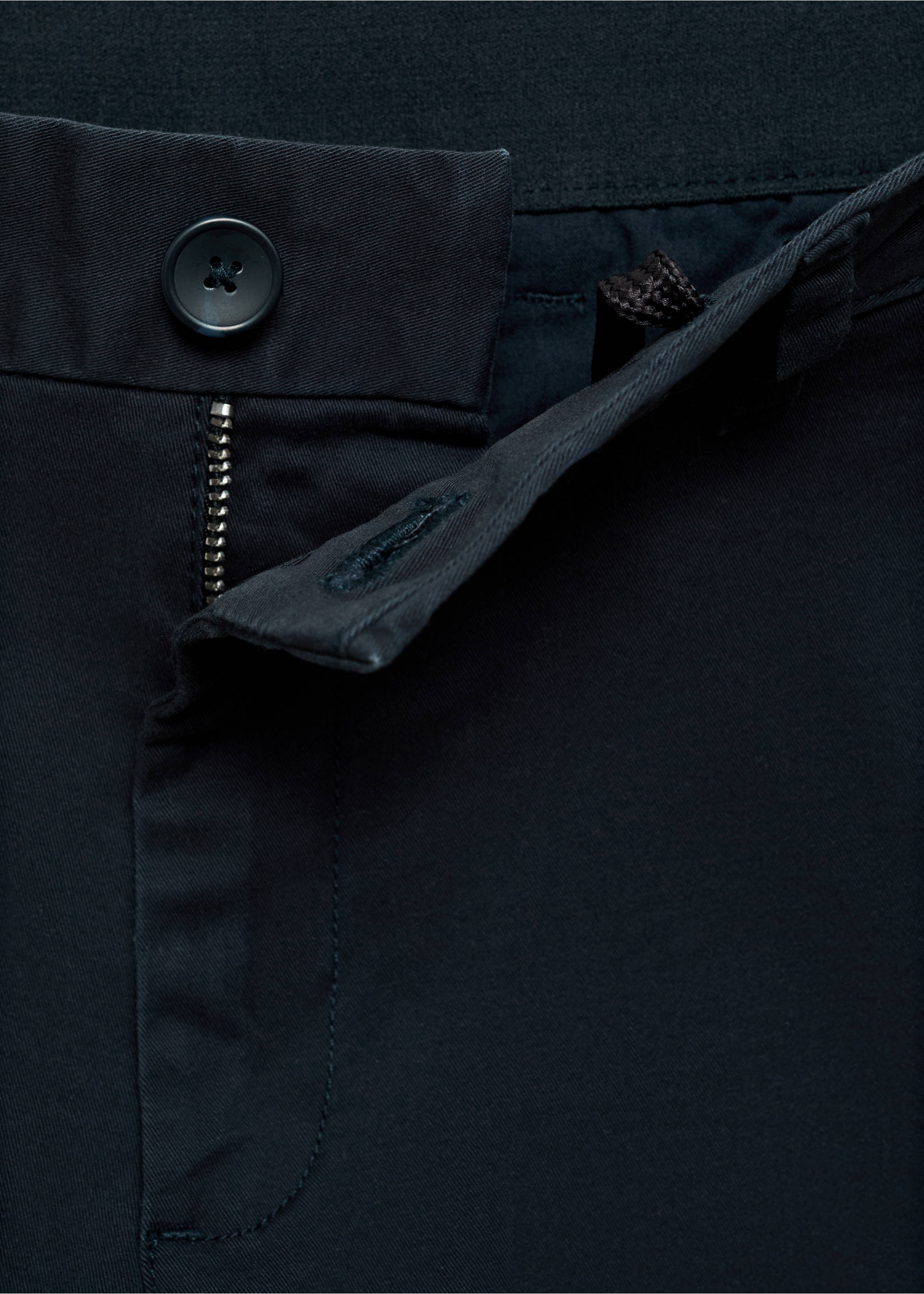 Close-up of navy trousers showing waistband and button closure, Dark Navy. Ref: 17041144-00.