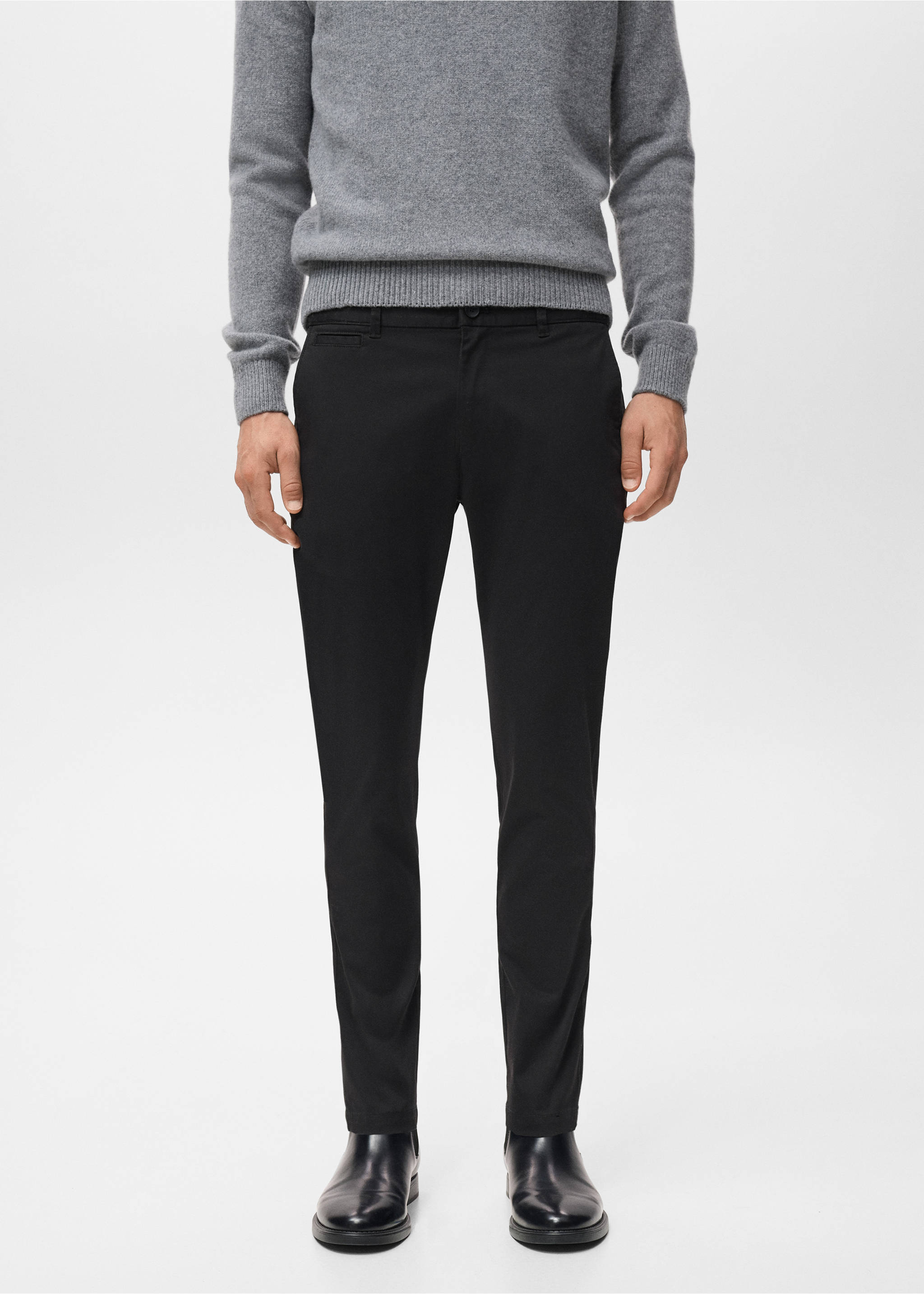 Black slim-fit trousers worn with a grey knitted sweater., Black. Ref: 17041144-00.