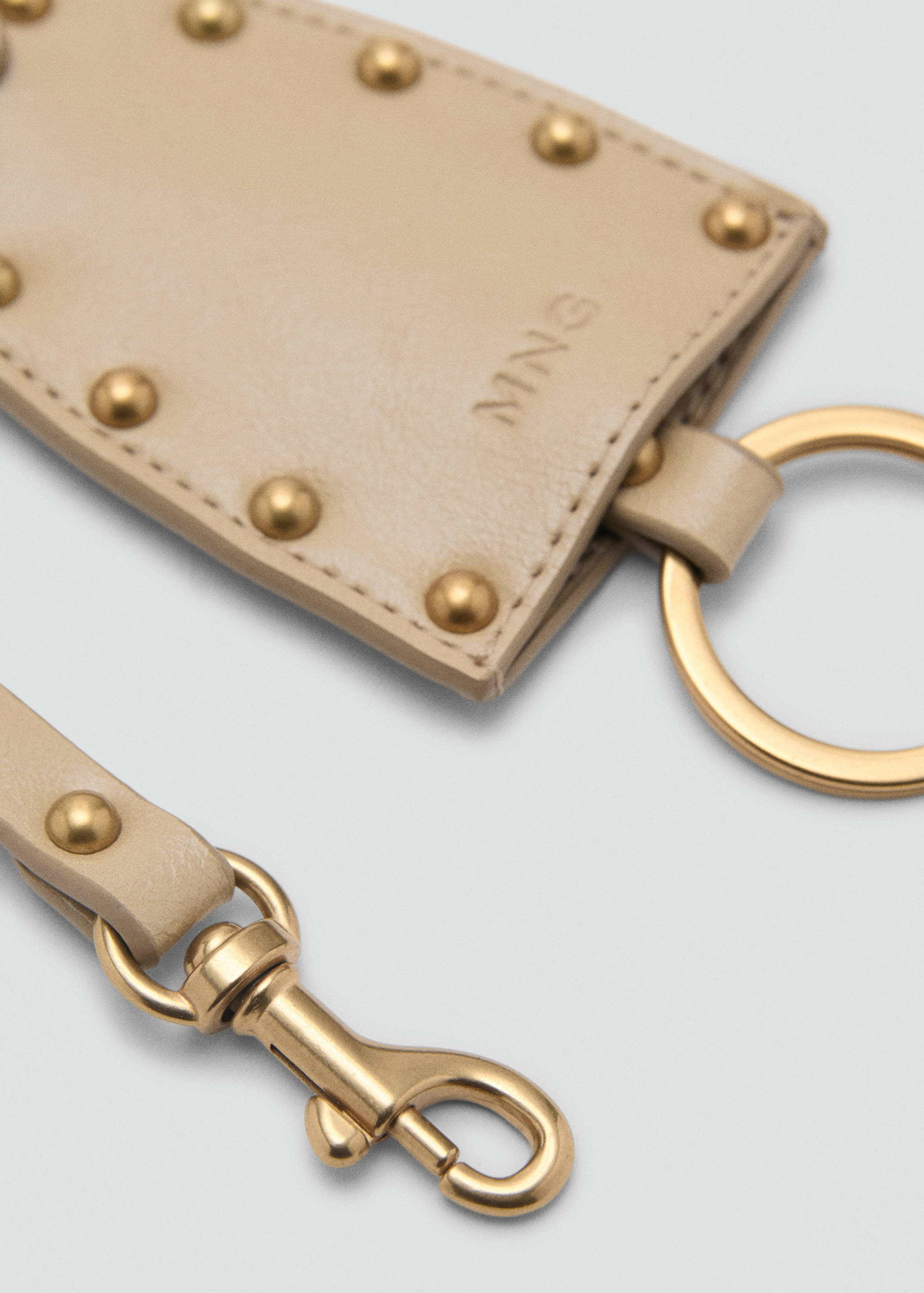 Sleutelhanger met leereffect en studs - Middenvlak
