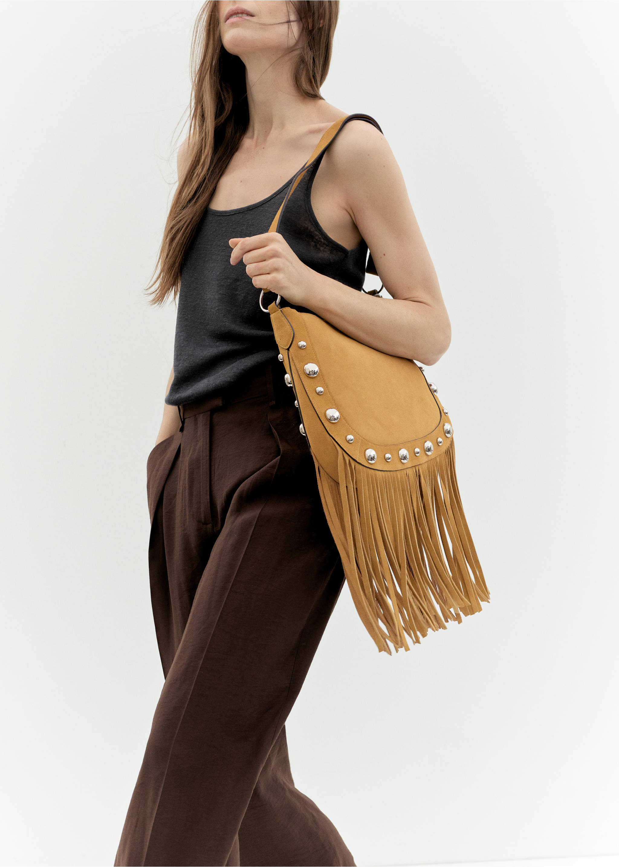 Suede bag with fringes and stud details - Details of the article 9, Mustard. Ref: 17041189-00.