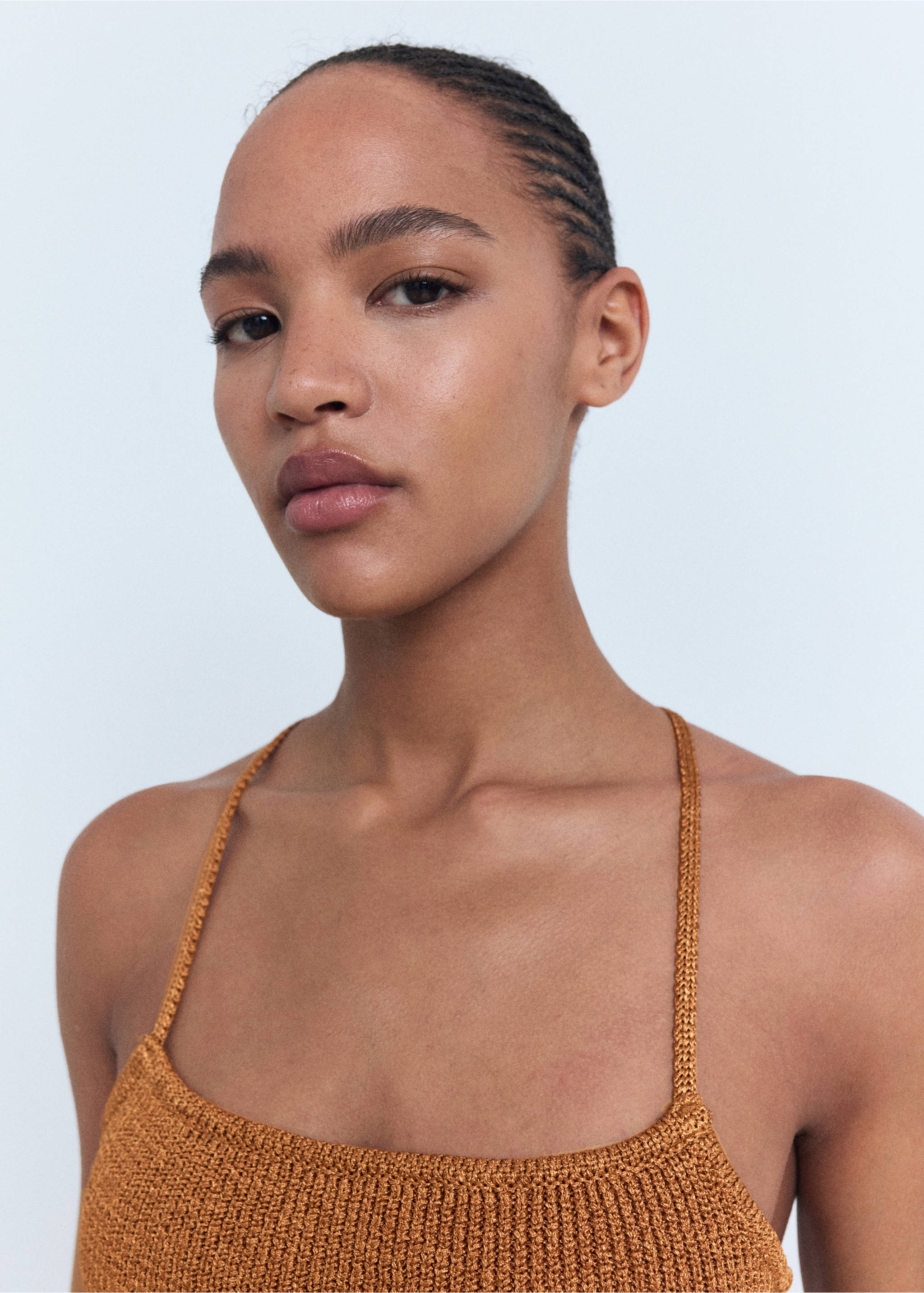 Lurex knitted top with crossed back - Details of the article 1, Copper. Ref: 17042899-00.