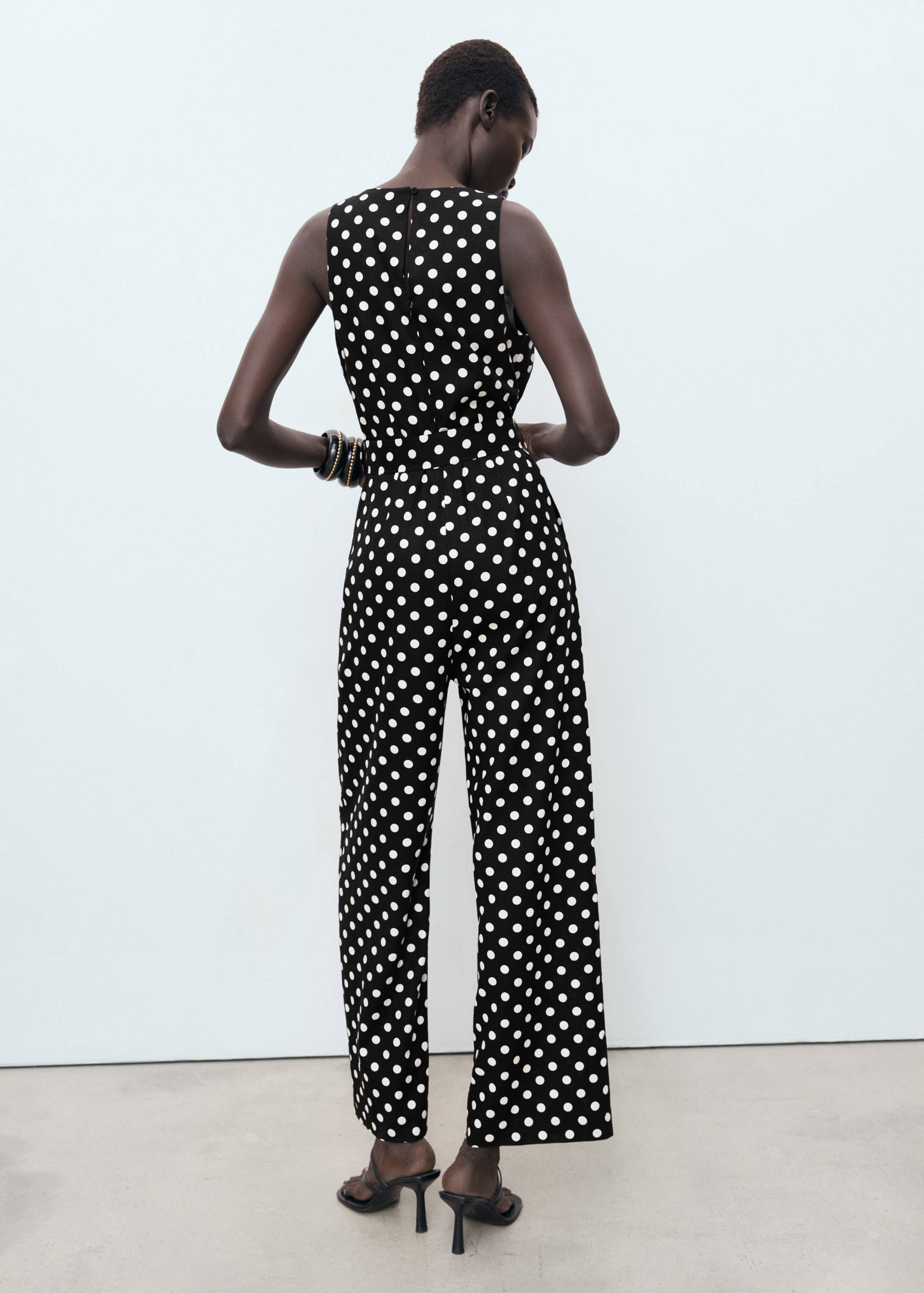 Polka-dot belt jumpsuit - Reverse of the article