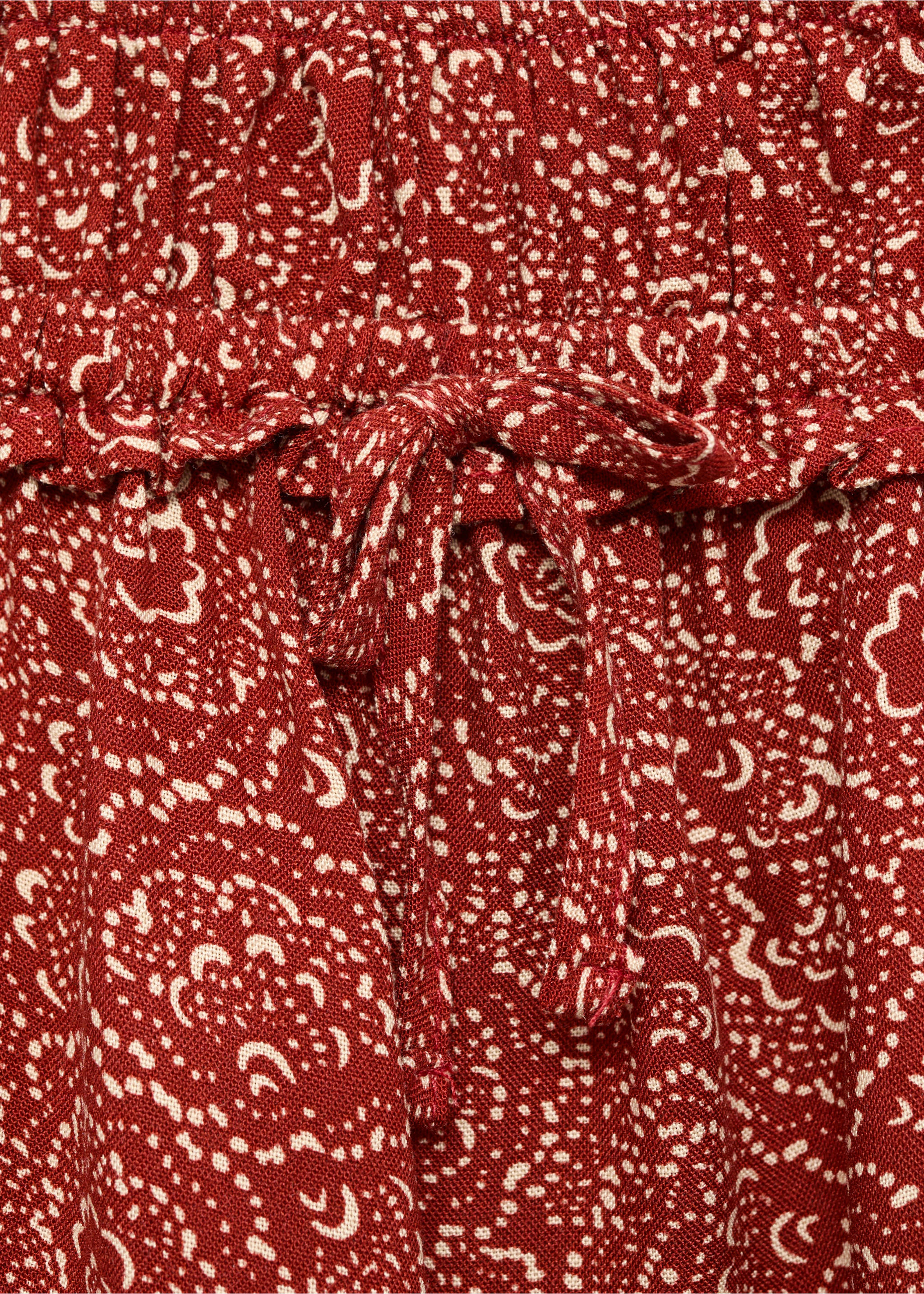 Jupe courte imprimée - Détail de l'article 8, Orange brûlé. Ref: 17043286-00.