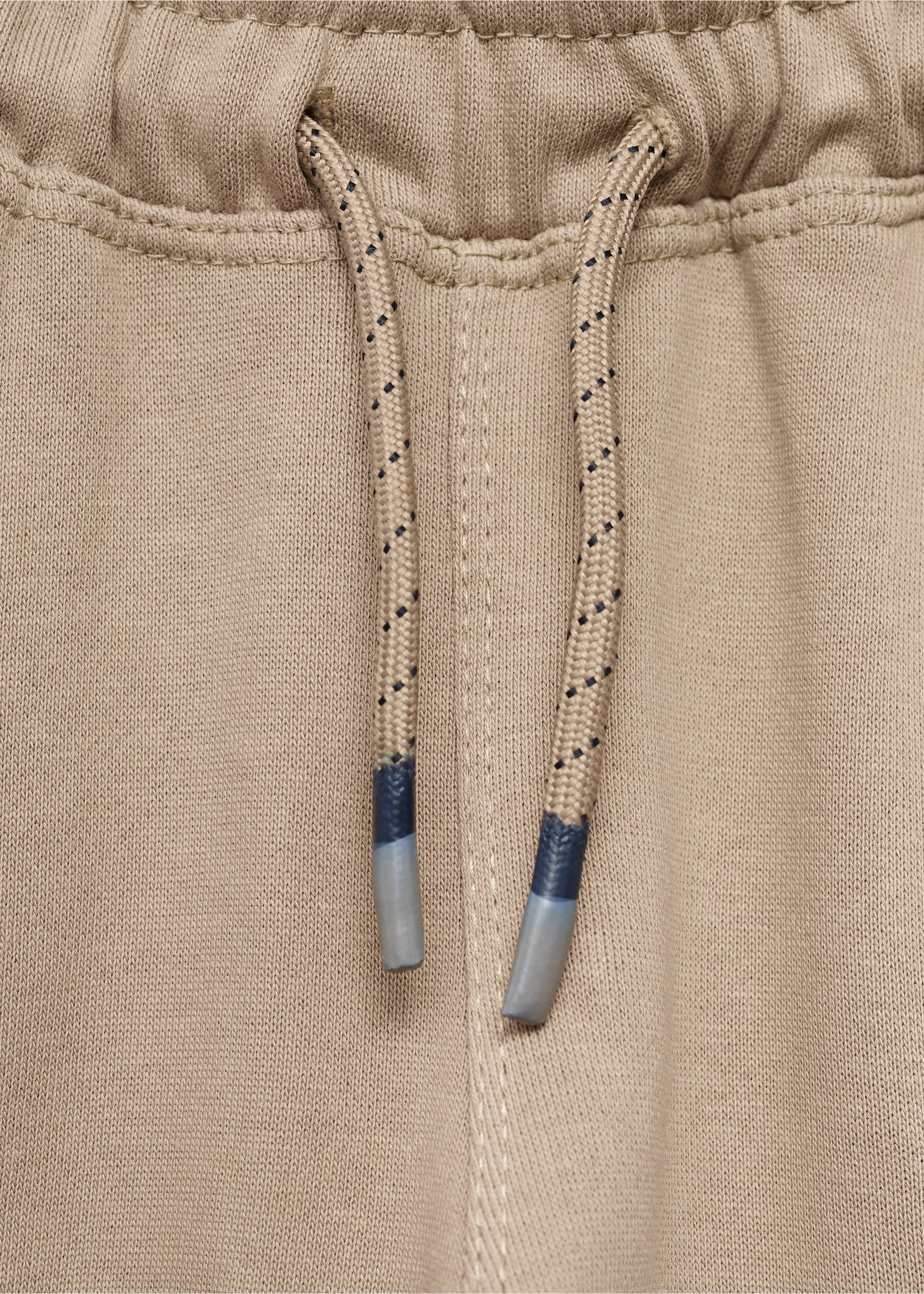 Cargo joggers with drawstring - Details of the article 8, Medium Brown. Ref: 17043287-00.