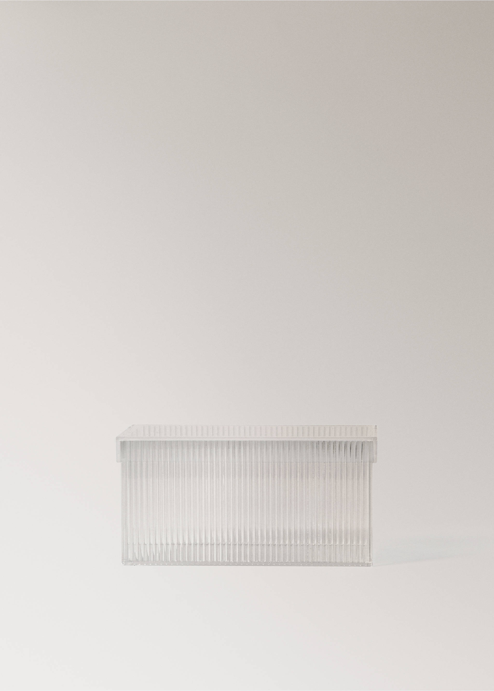 Clear plastic storage box with a lid and vertical ribbed detailing., Black. Ref: 17043312-00.