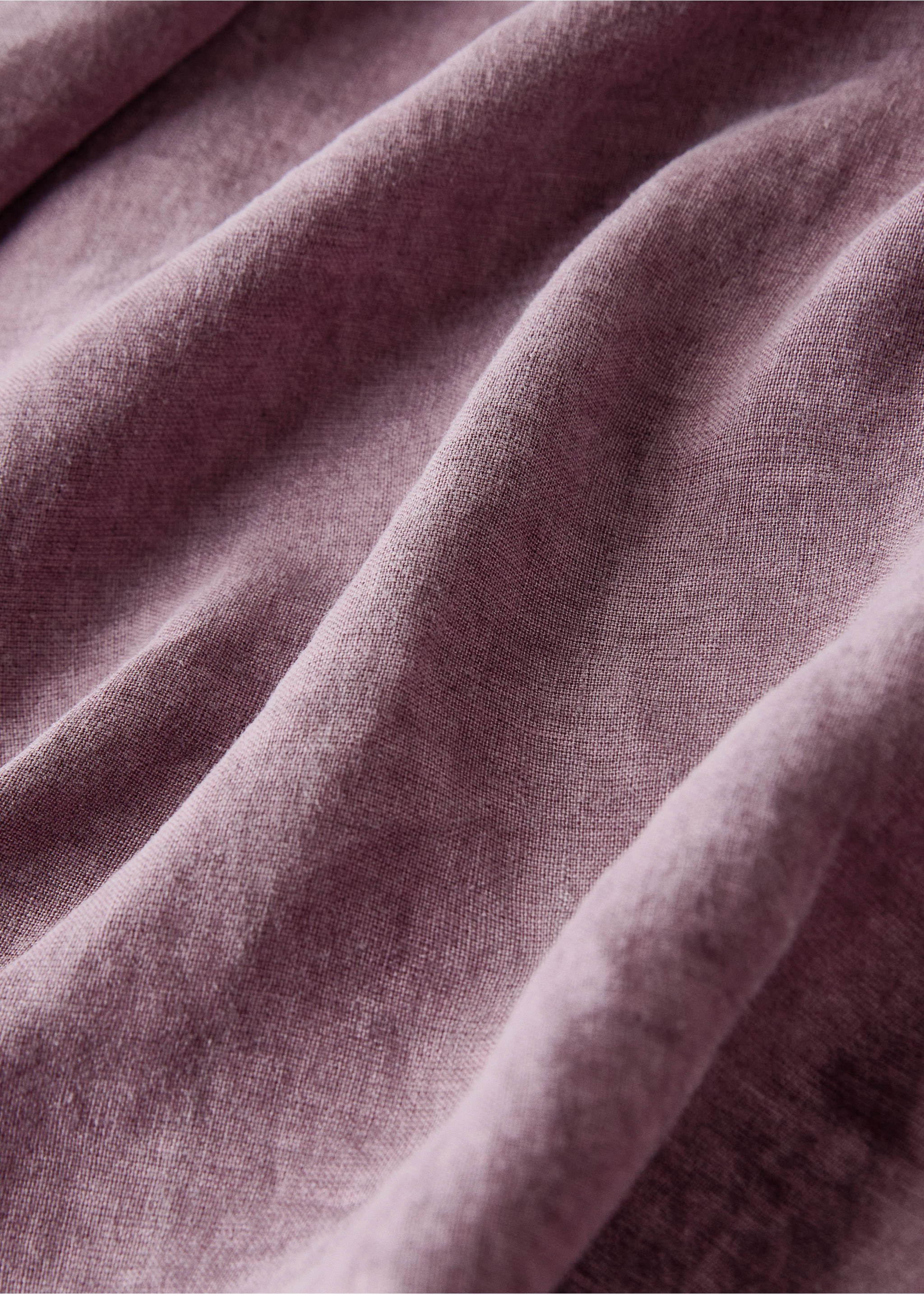 Close-up of a textured mauve-pink tablecloth fabric., Plum. Ref: 17043323-00.